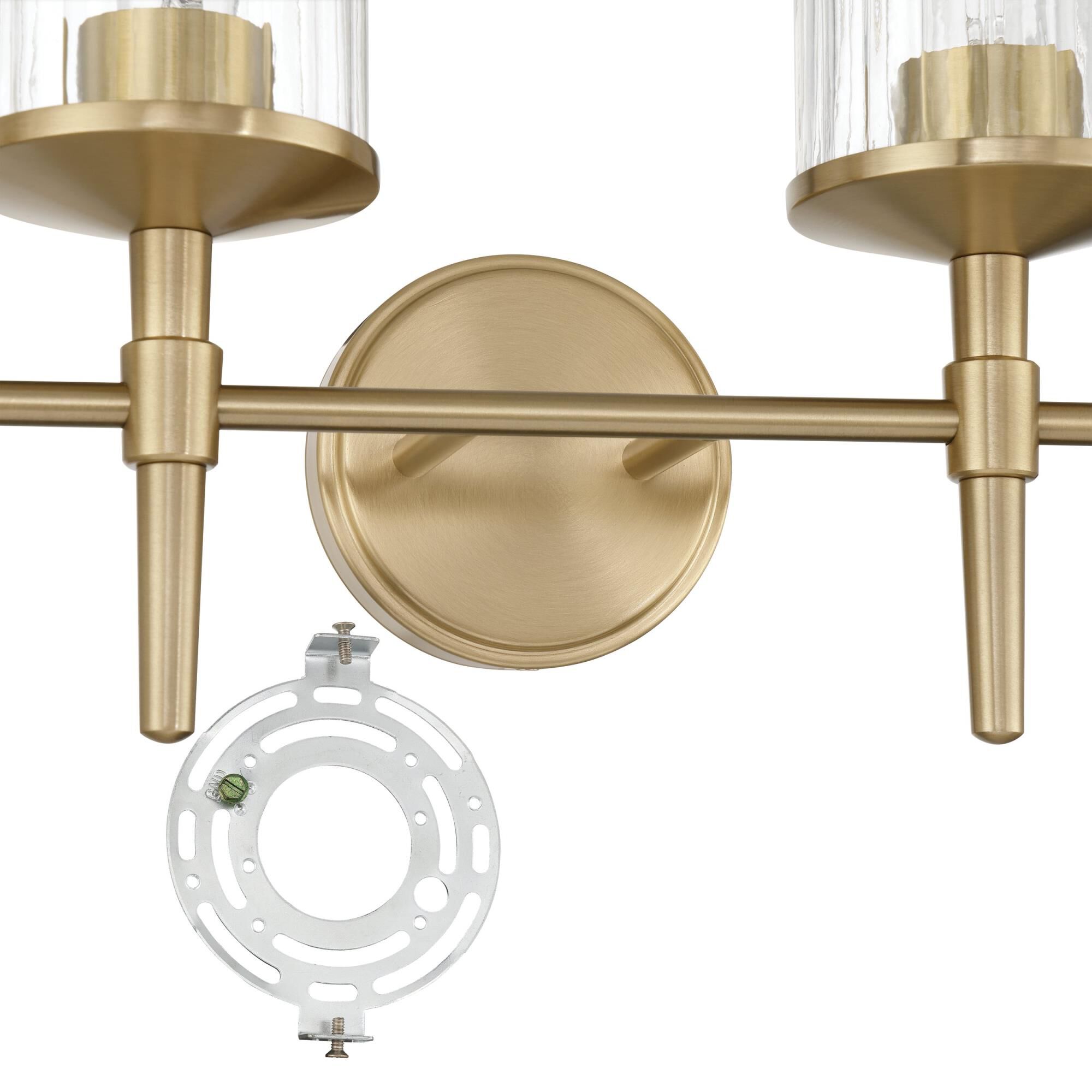 Shown in Champagne Gold finish and Clear Ribbed glass