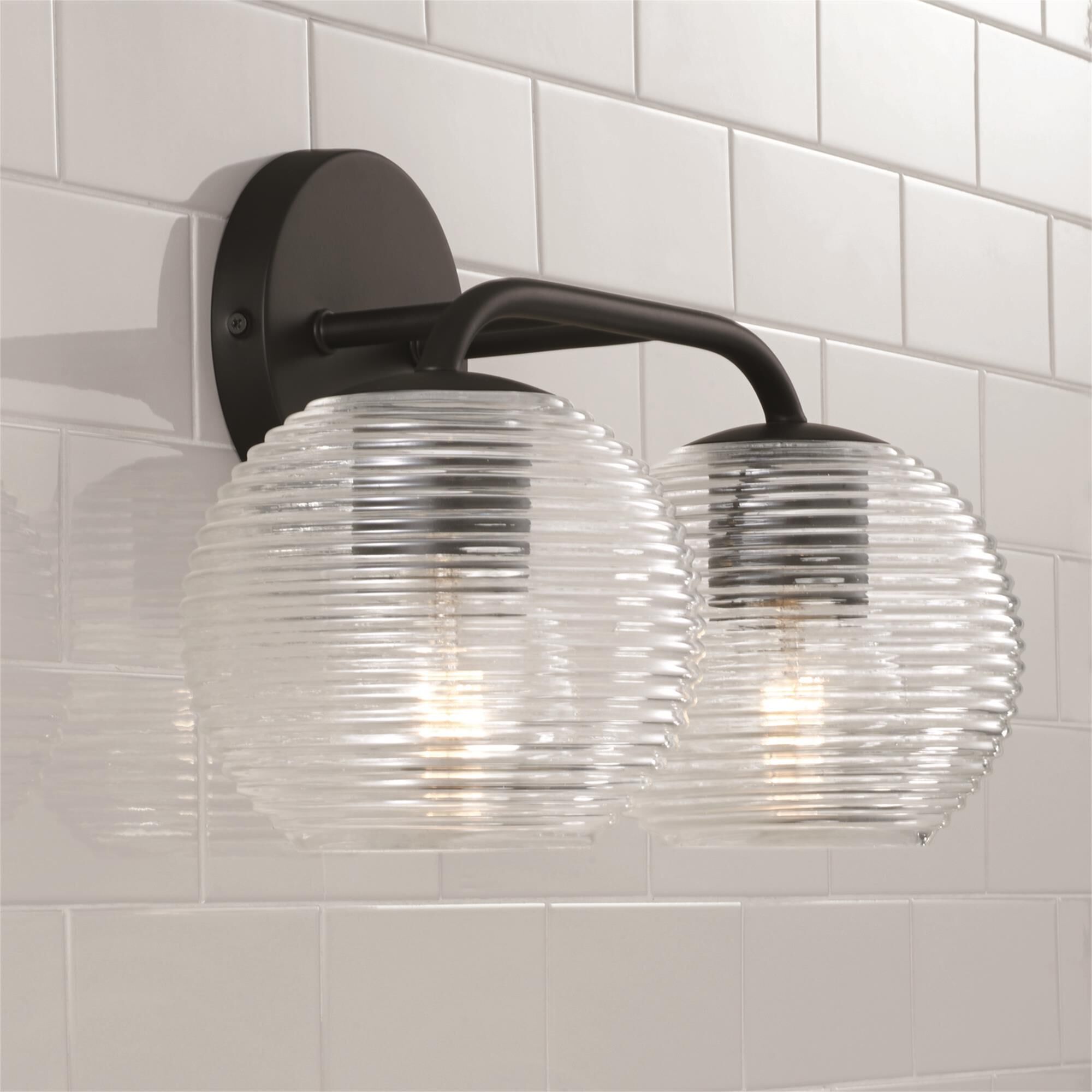 Shown in Matte Black finish and Clear Ribbed glass