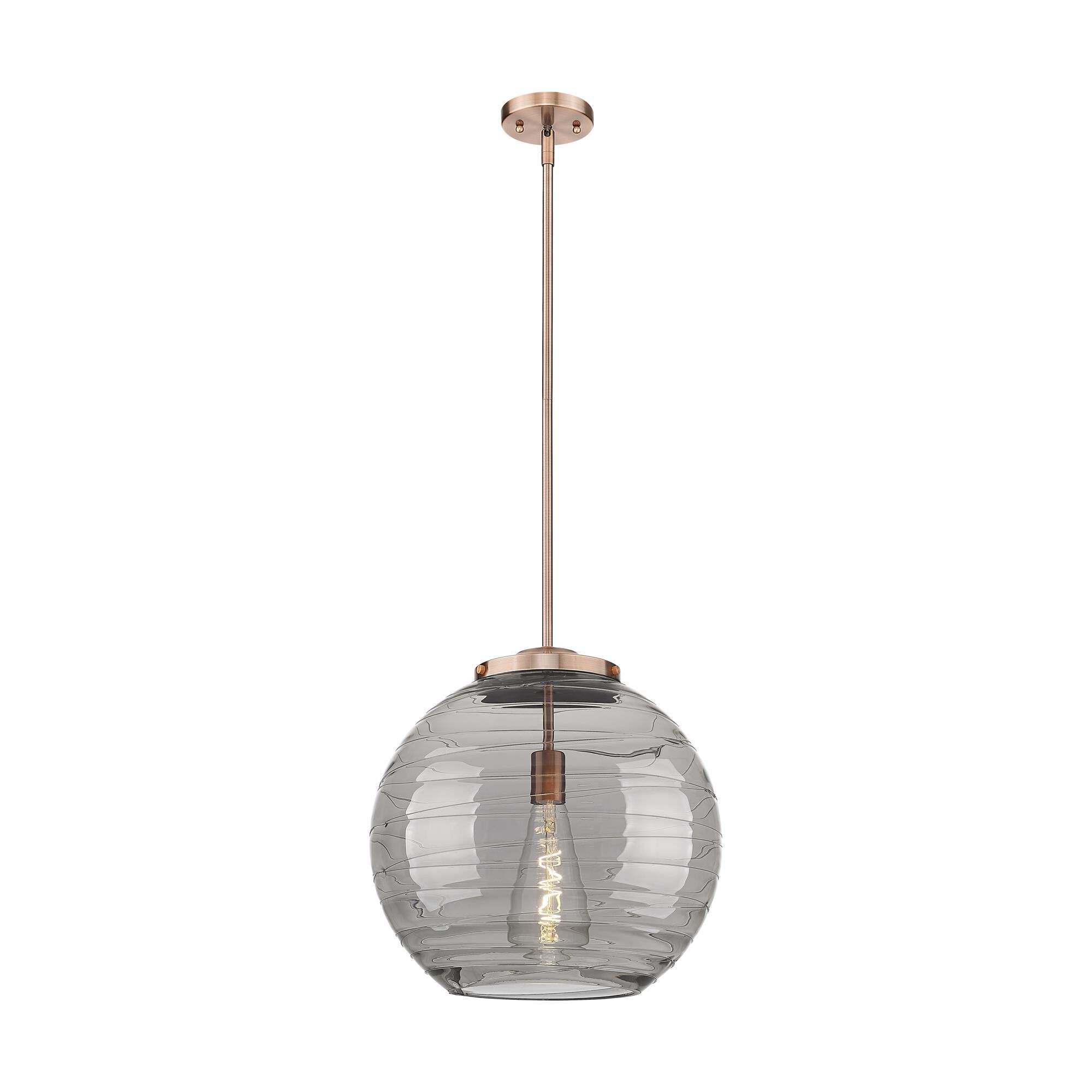 Shown in Antique Copper finish and Light Smoke Deco Swirl glass