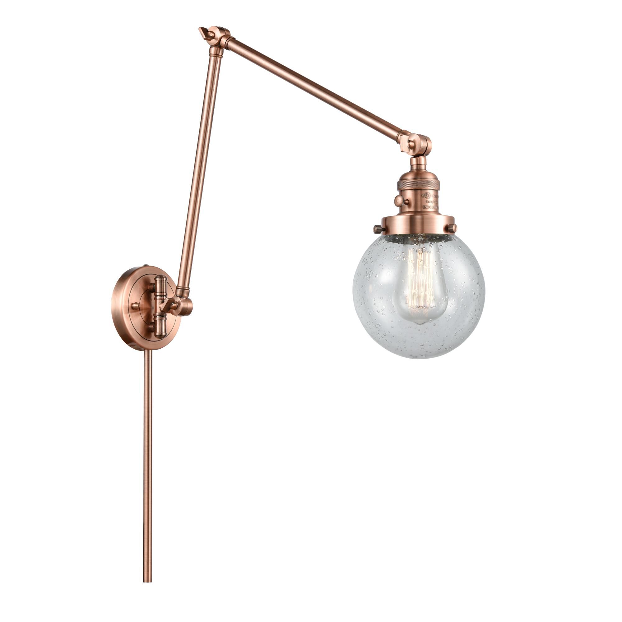 Shown in Antique Copper finish and Seedy Beacon glass