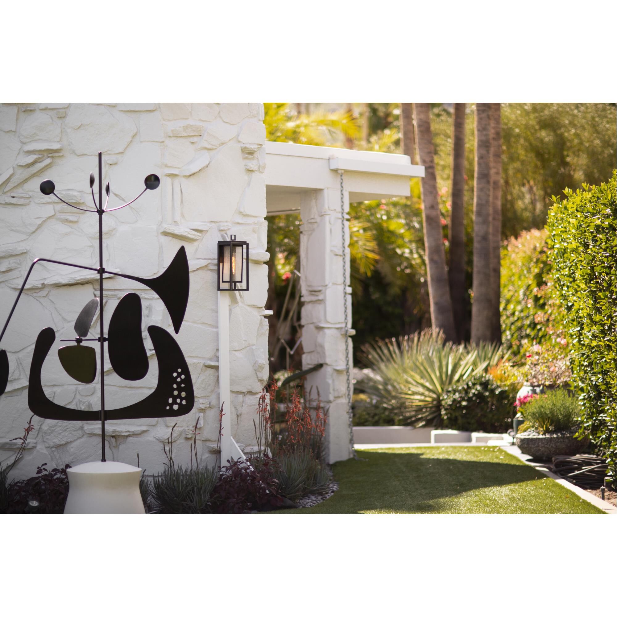 Shown in Black finish and Clear Seedy glass