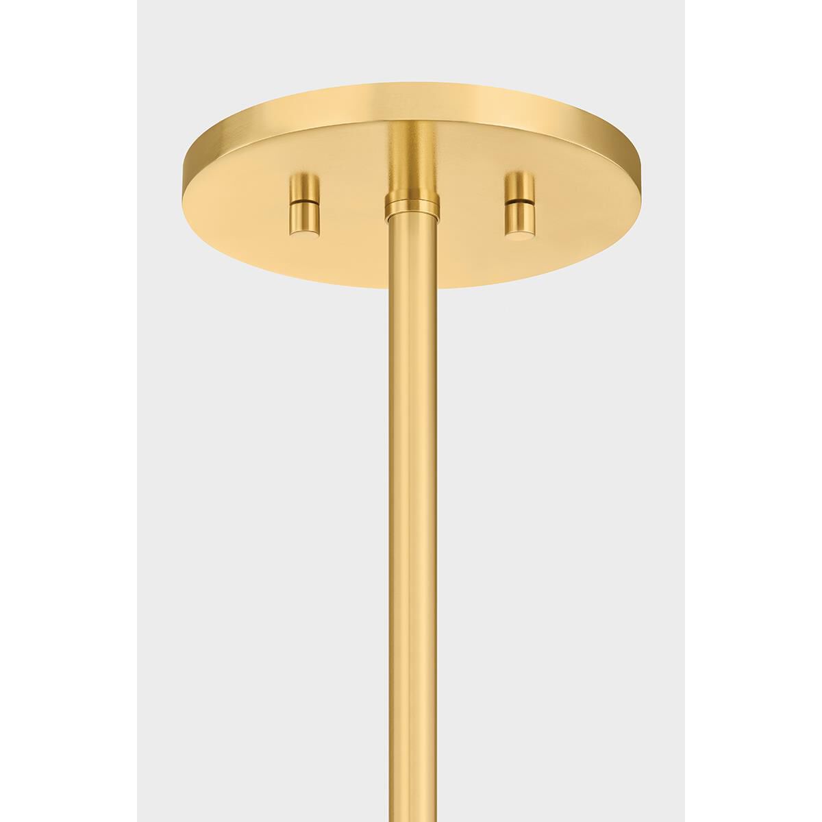 Shown in Aged Brass finish and Natural Woven Rattan shade