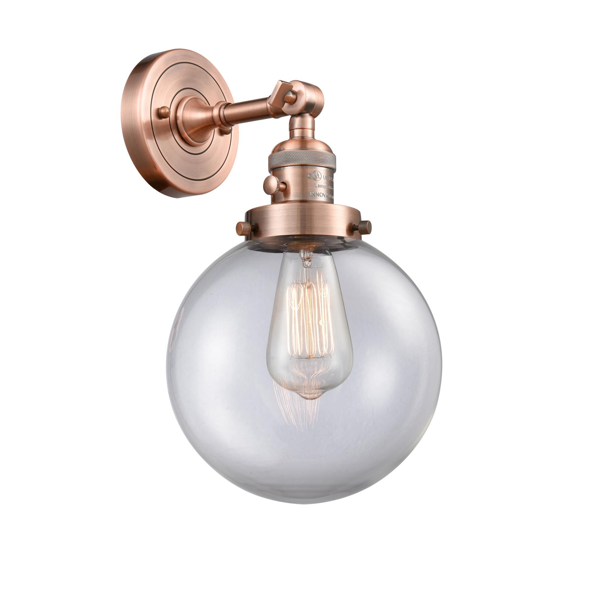 Shown in Antique Copper finish and Clear glass and Switch on Socket accent