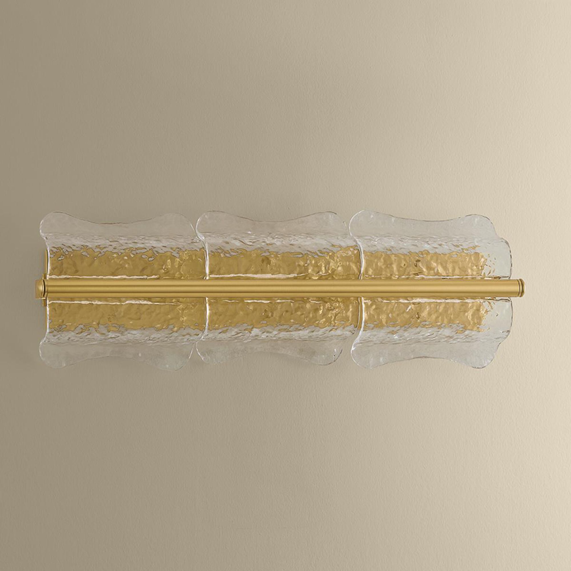 Shown in Aged Brass finish and Clear Optic glass