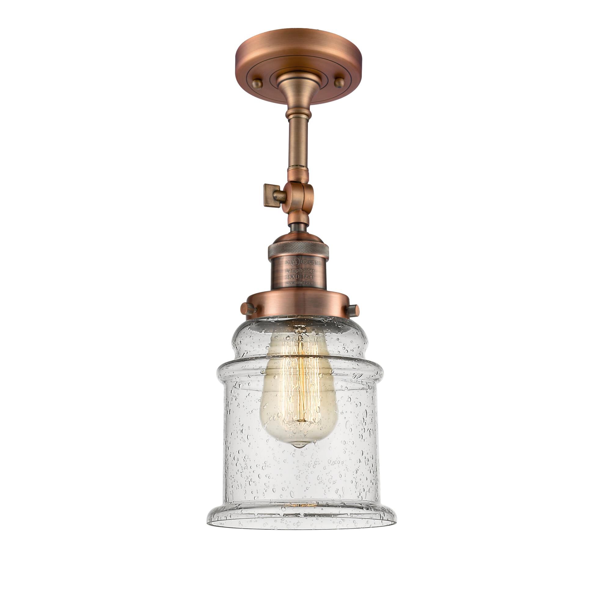 Shown in Antique Copper finish and Seedy glass and None accent