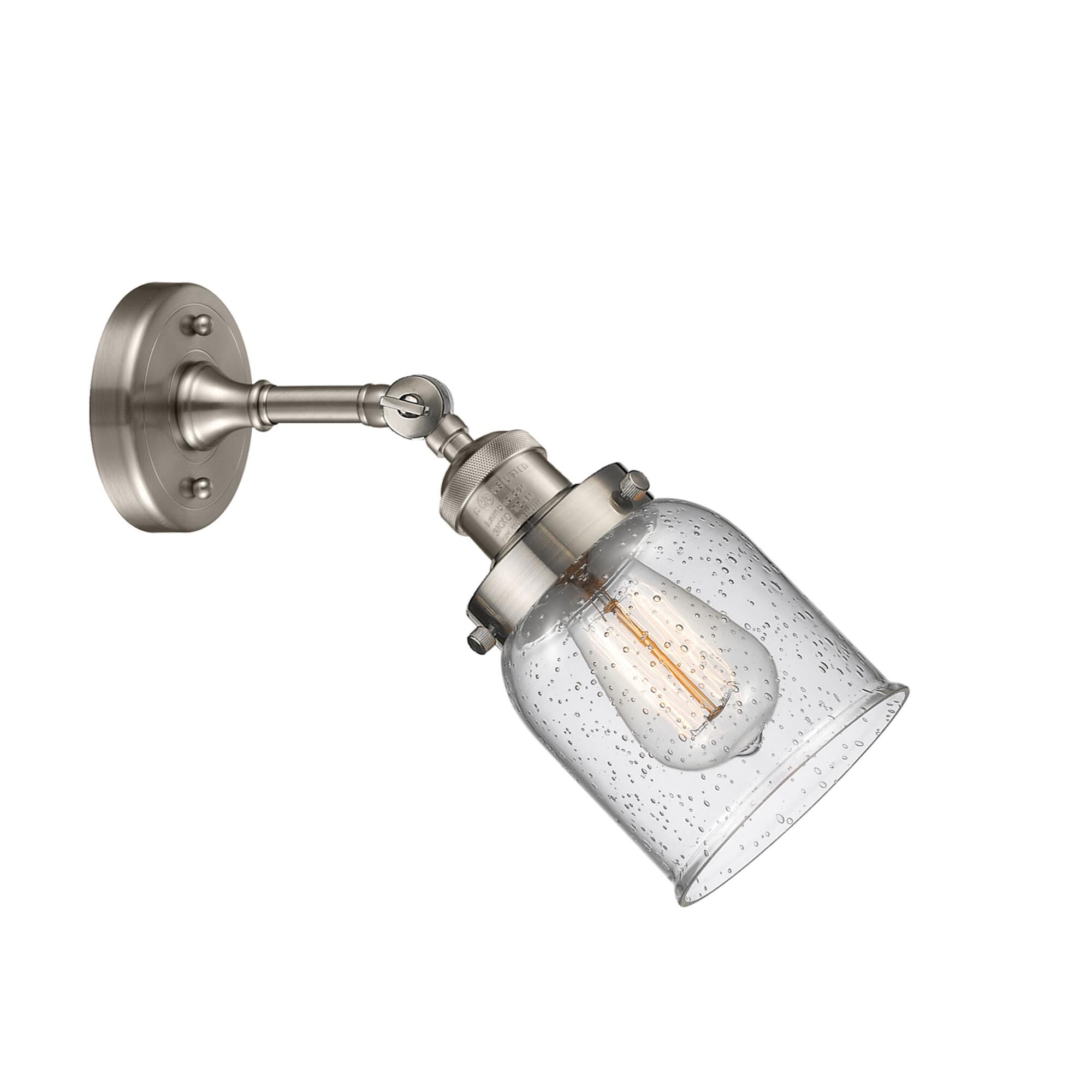 Shown in Brushed Satin Nickel finish and Seedy glass and None accent