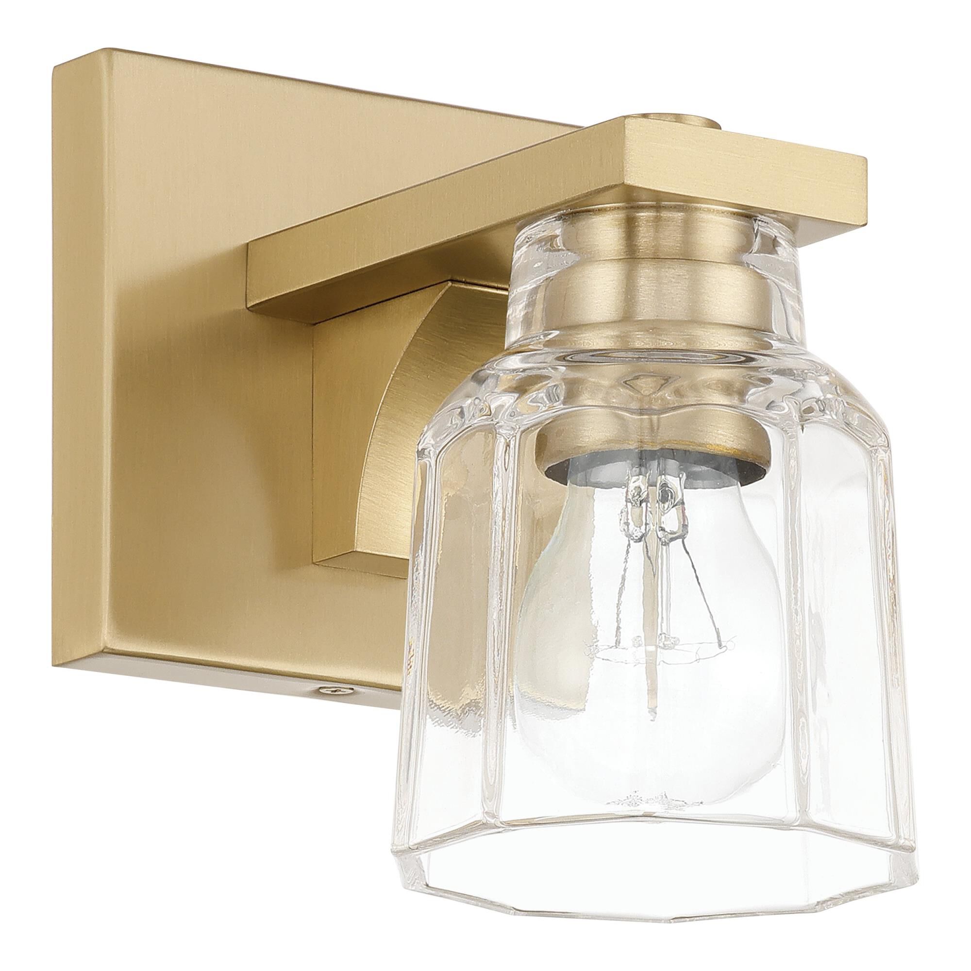Shown in Champagne Gold finish and Clear Ribbed glass