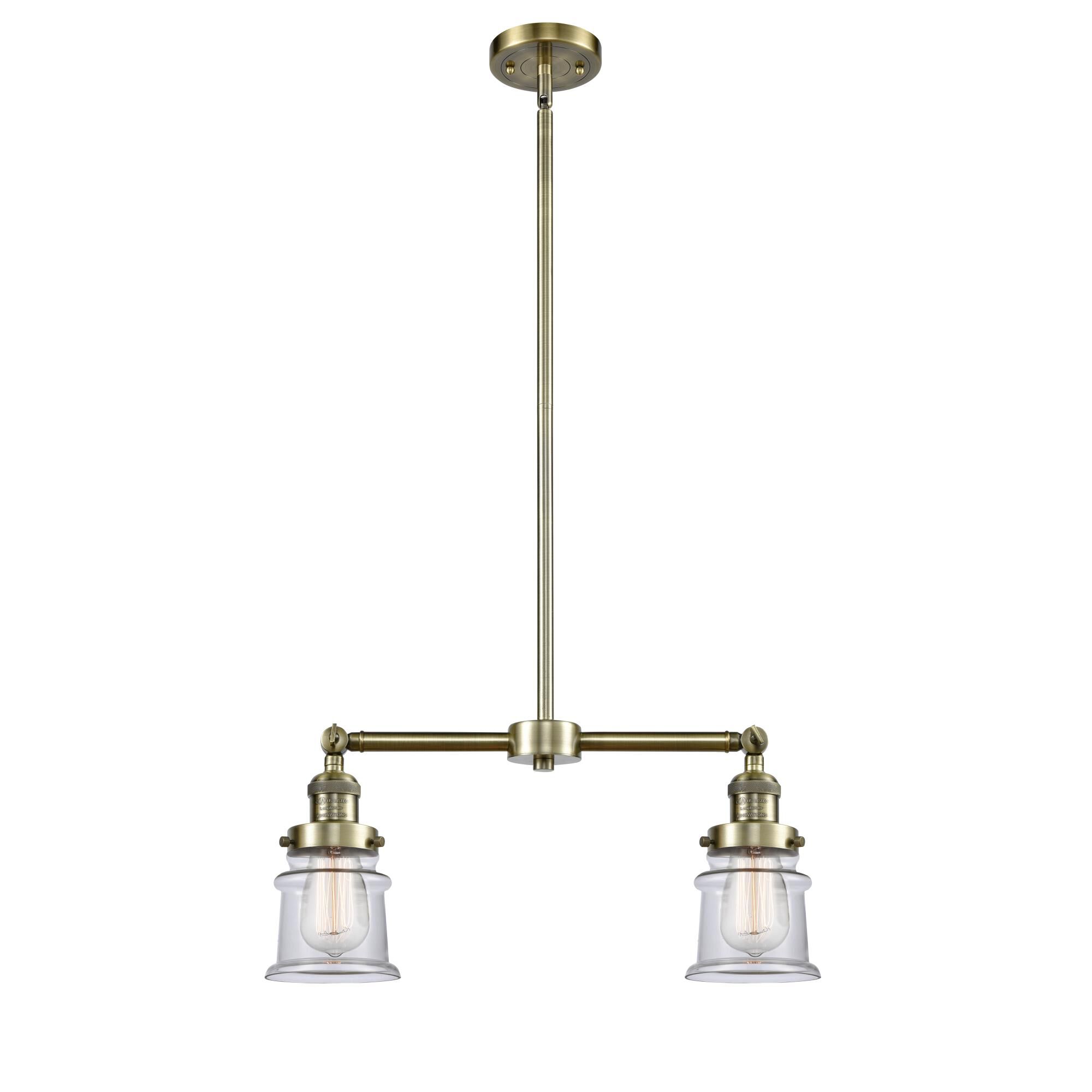Shown in Antique Brass finish and Clear glass