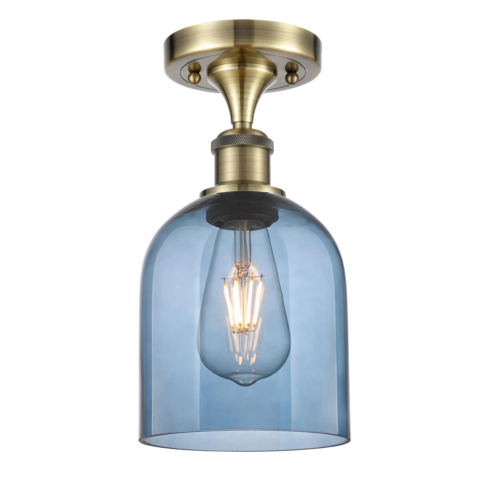 Shown in Antique Brass finish and Princess Blue glass