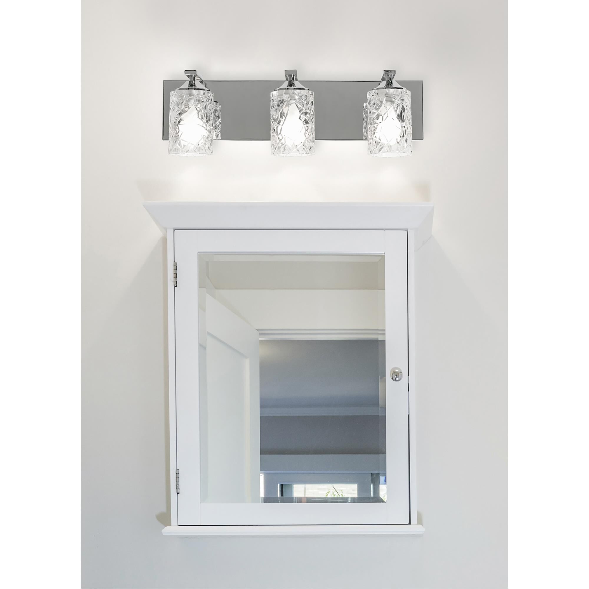 Shown in Polished Chrome finish and Clear Facetted glass