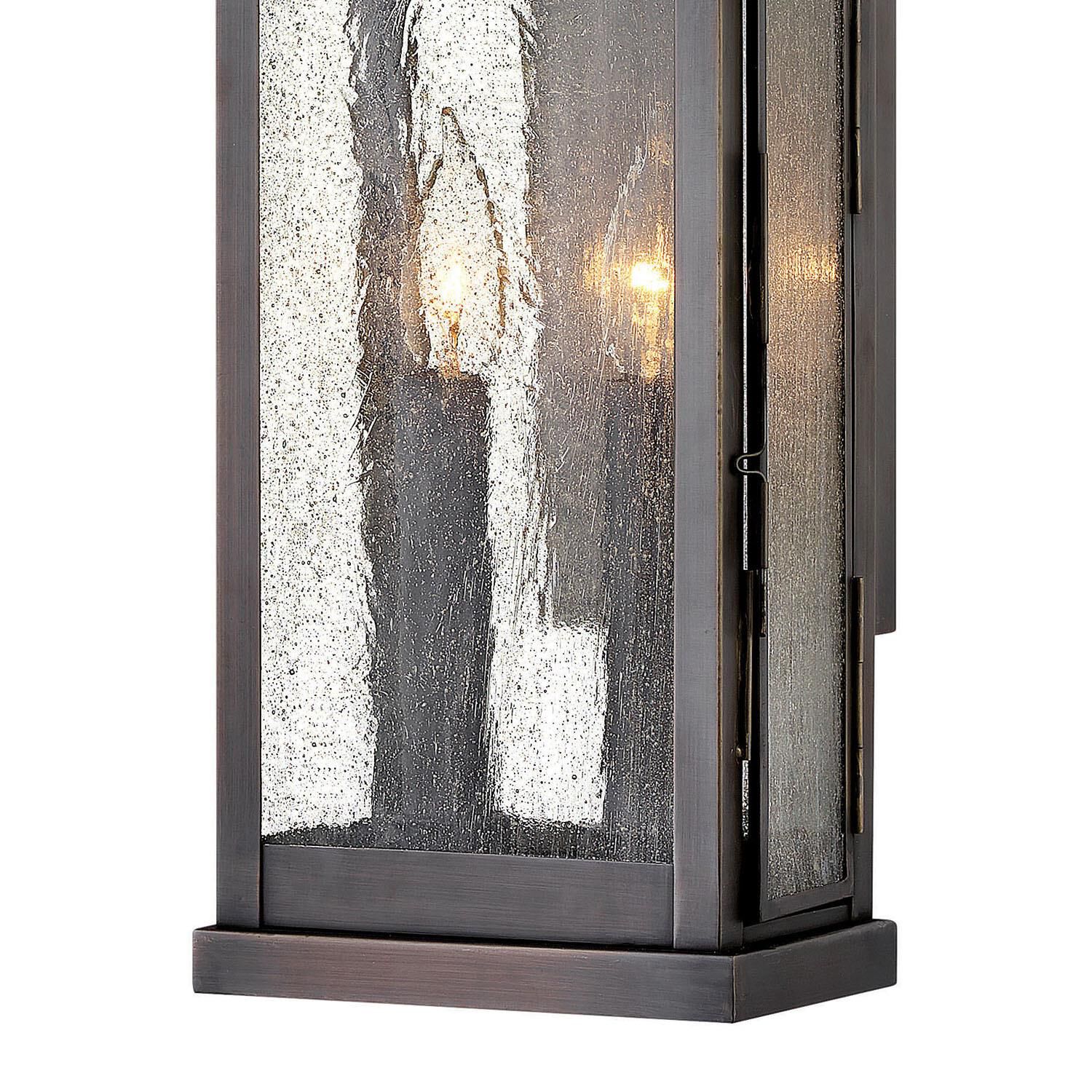 Shown in Blackened Brass finish and Clear Seedy glass