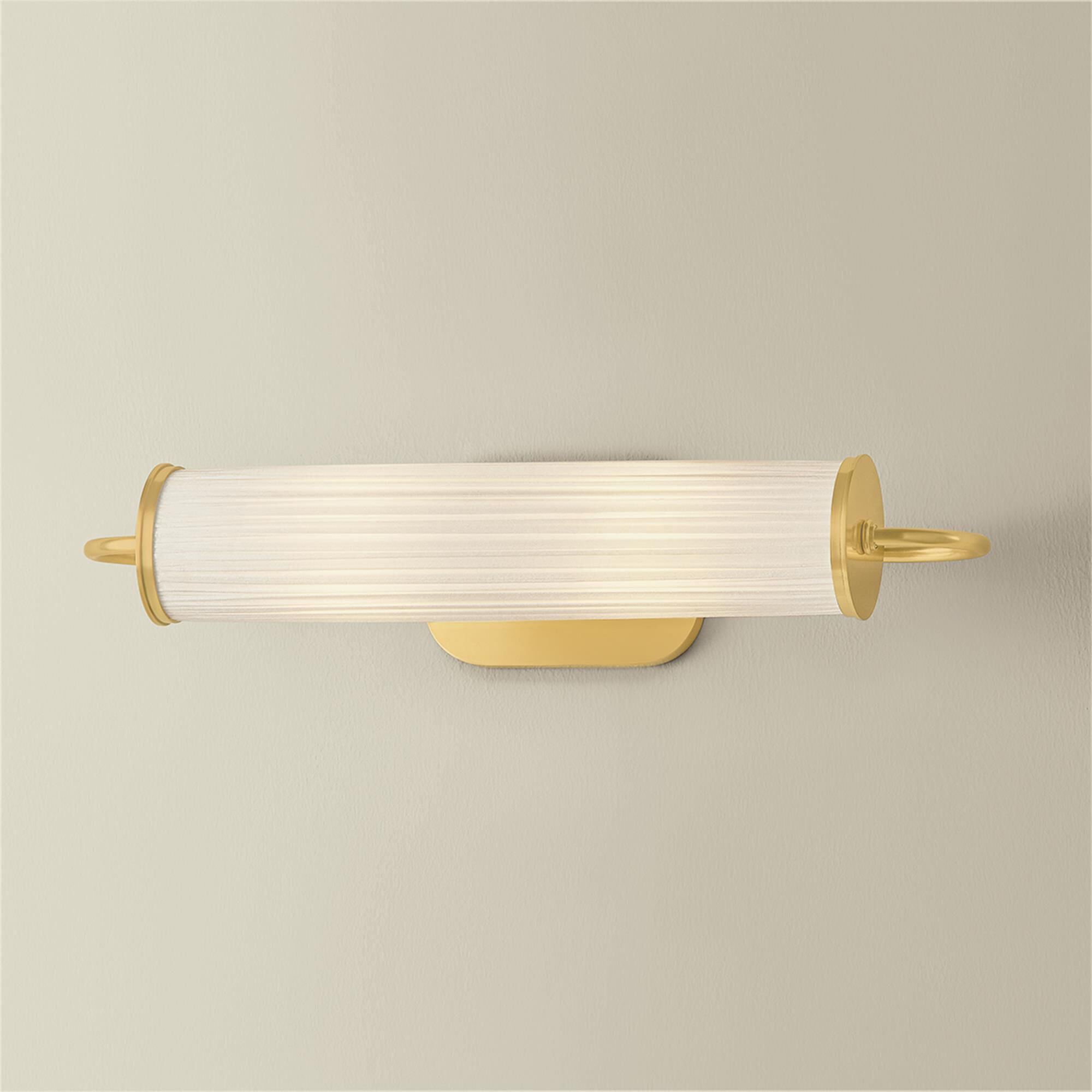 Shown in Aged Brass finish and Ivory Silk shade