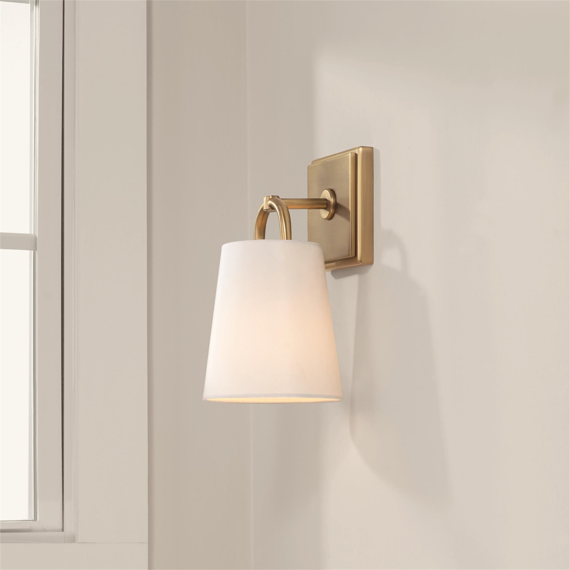 Shown in Aged Brass finish and White Fabric shade
