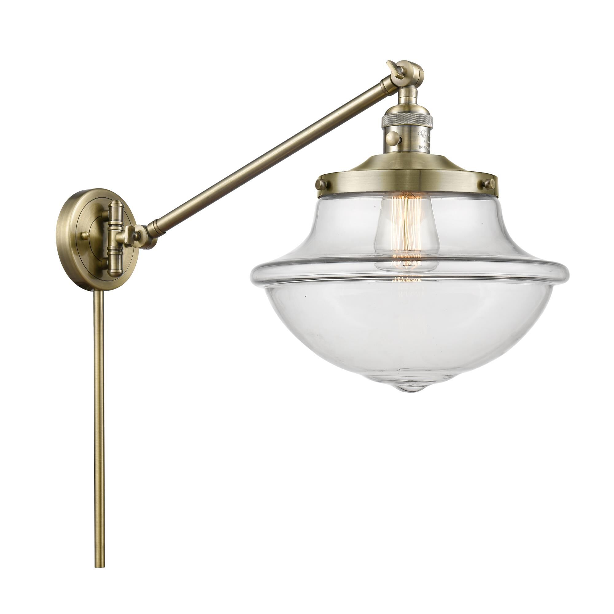 Shown in Antique Brass finish and Schoolhouse glass and Glass shade
