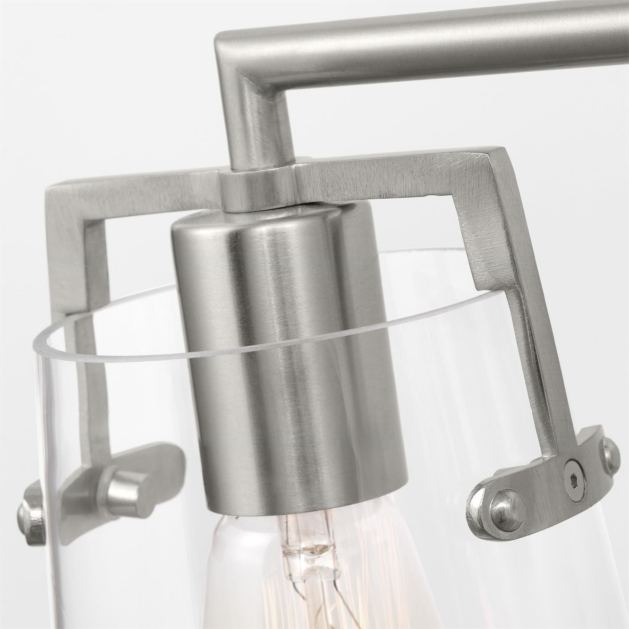 Shown in Brushed Steel finish and Clear Glass s shade