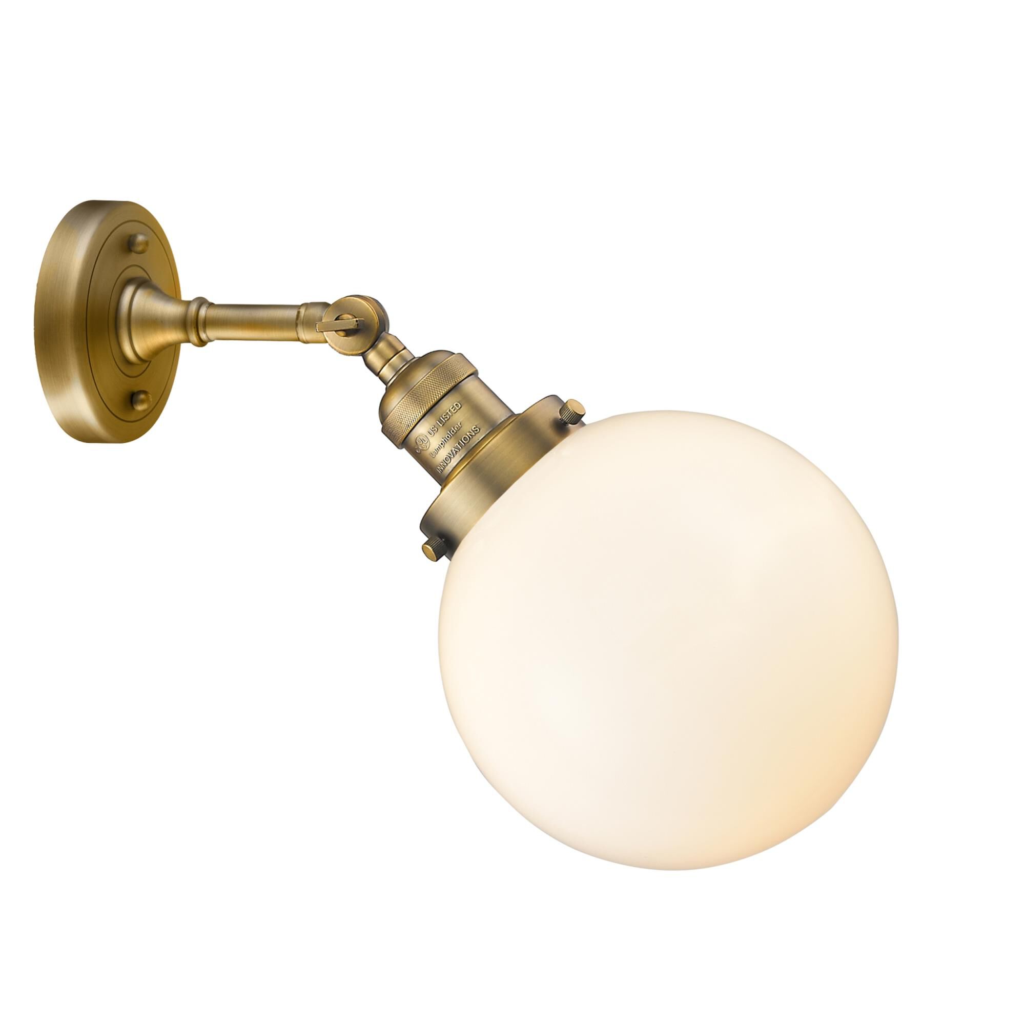 Shown in Brushed Brass finish and Matte White Cased glass and No Accent accent