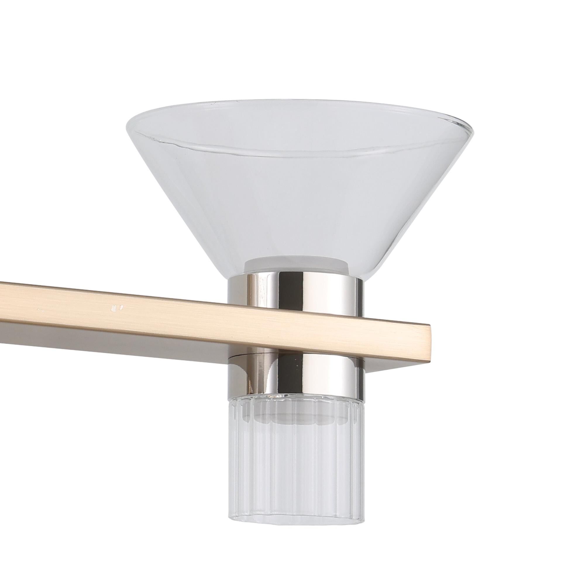 Shown in Champagne Gold finish and Clear, Clear Ribbed glass