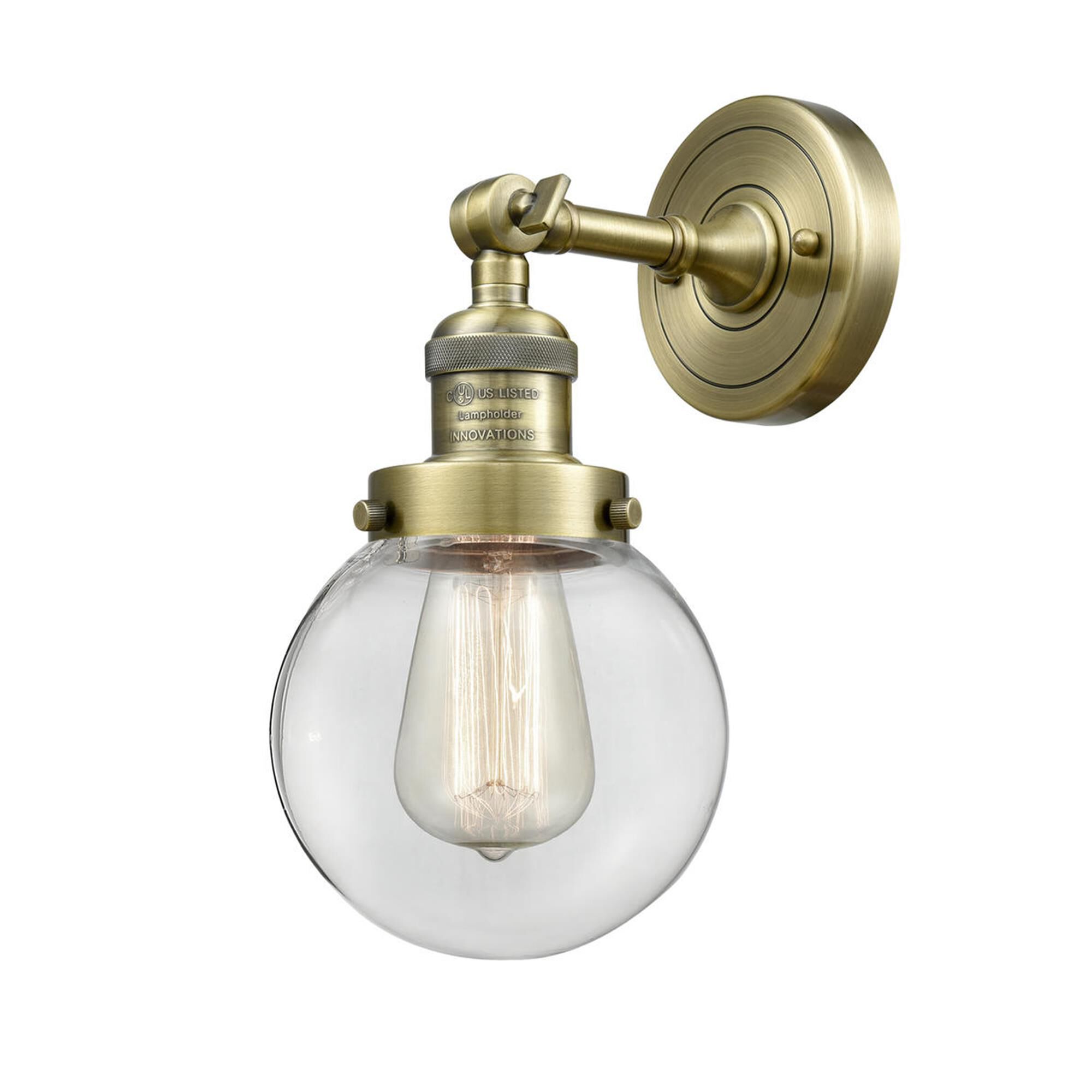 Shown in Antique Brass finish and Clear glass and No Accent accent