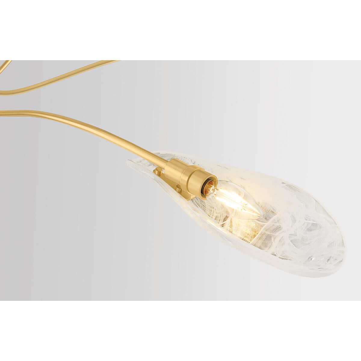 Shown in Aged Brass finish and Piastre With White Swirl glass