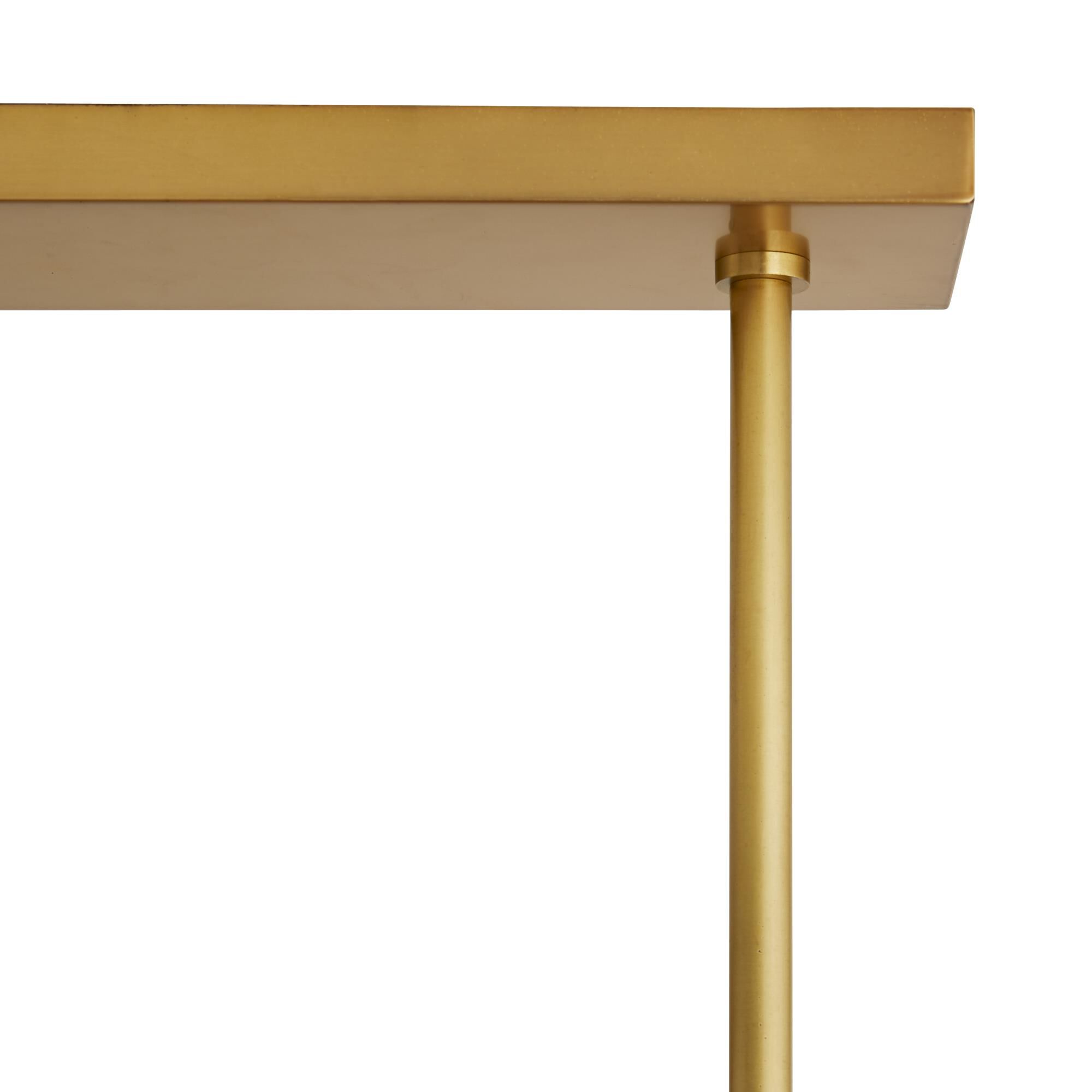 Shown in Antique Brass finish and Linen shade