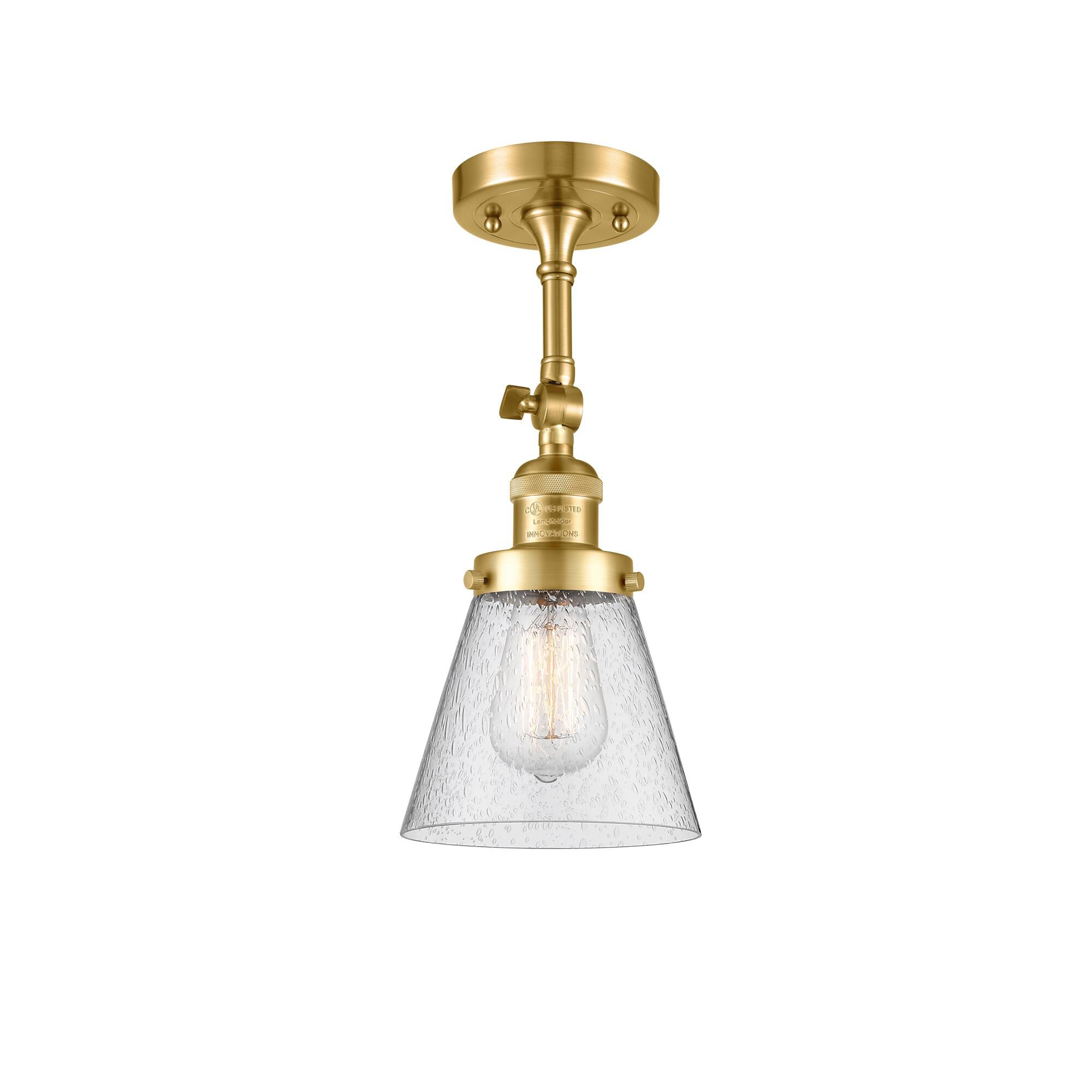 Shown in Satin Gold finish and Seedy glass and None accent