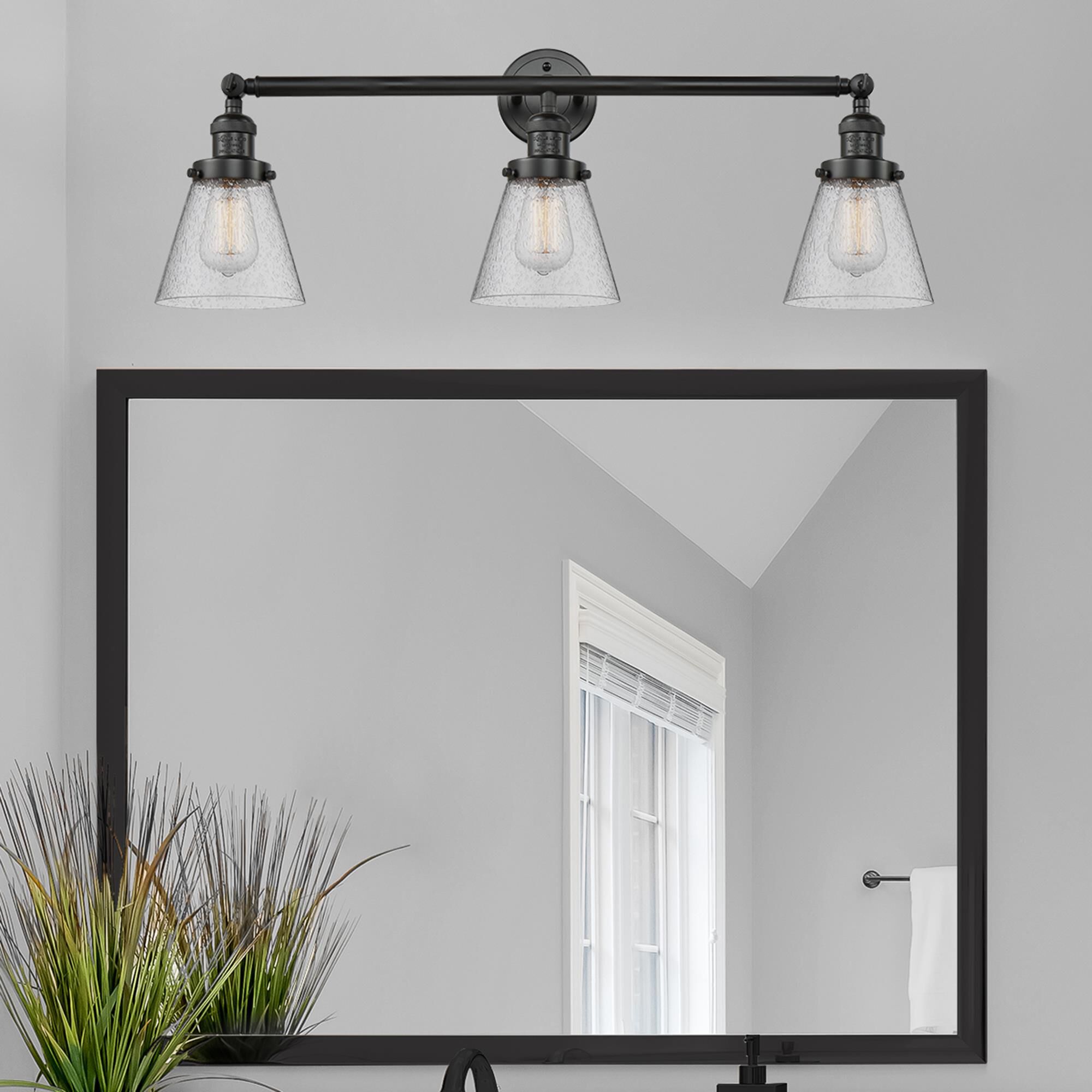 Shown in Matte Black finish and Seedy glass