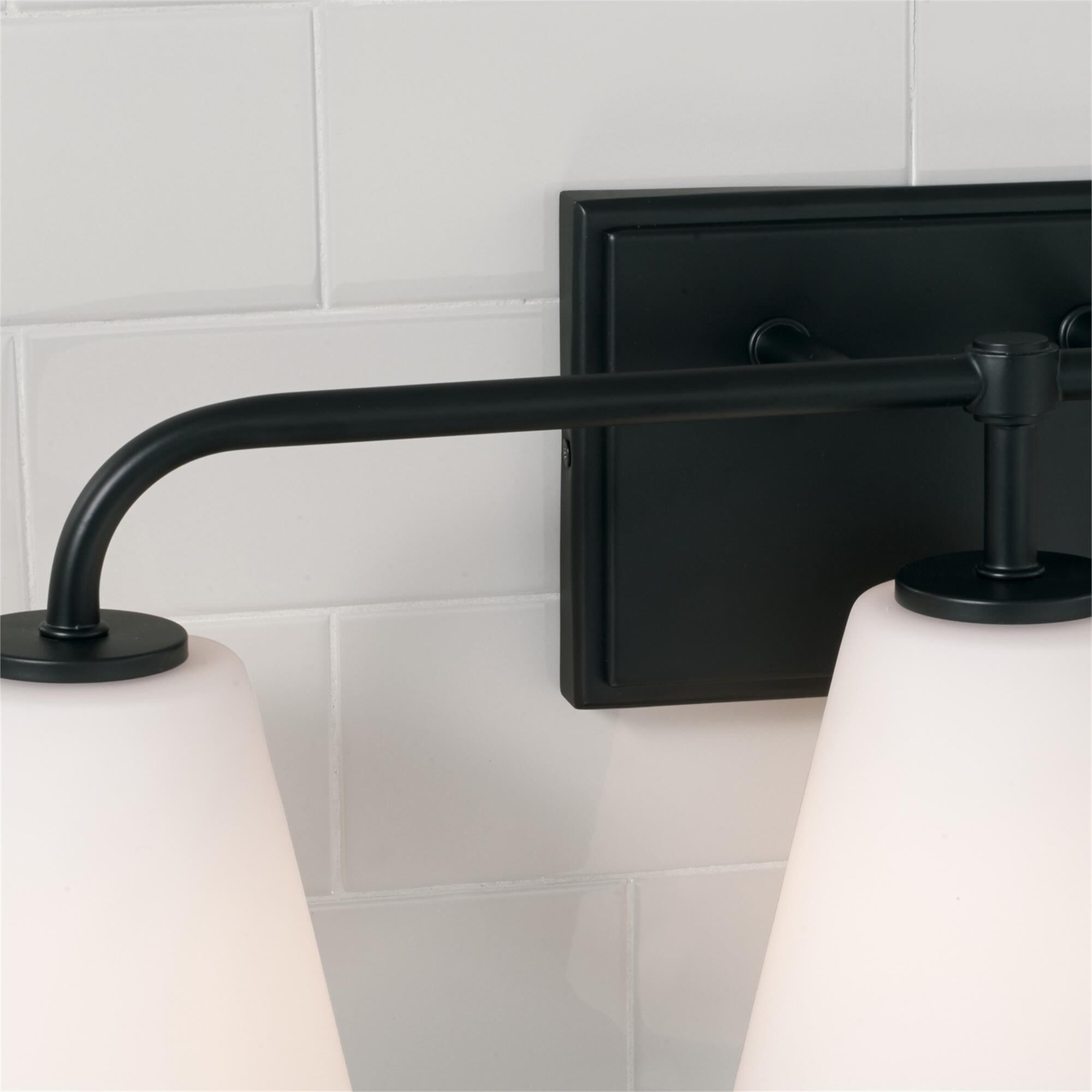 Shown in Matte Black finish and Soft White glass
