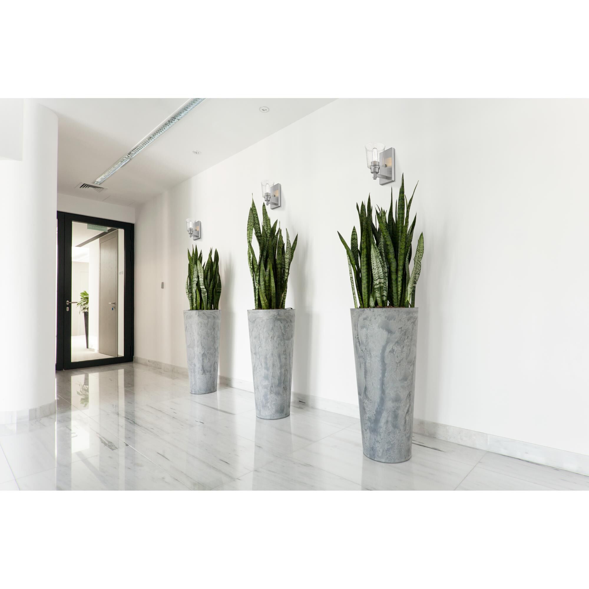 Shown in Brushed Nickel finish and Glass shade