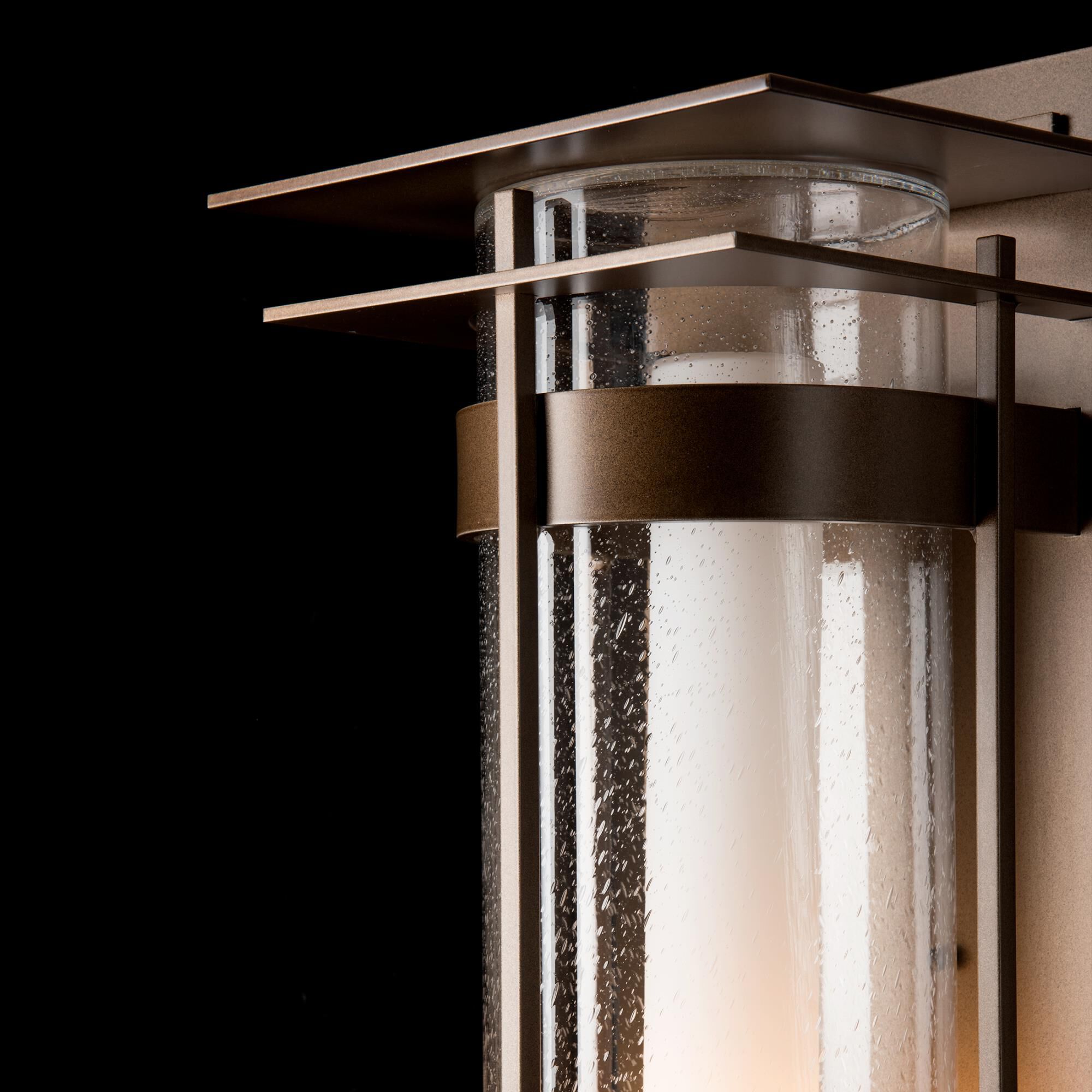 Shown in Coastal Bronze finish and Opal And Seeded glass