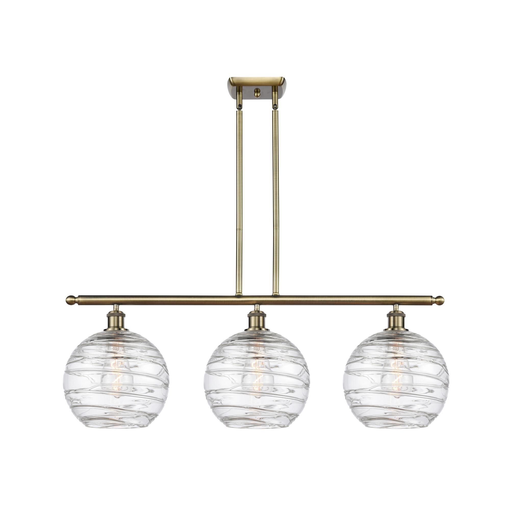 Shown in Antique Brass finish and Clear Athens Deco Swirl 8
