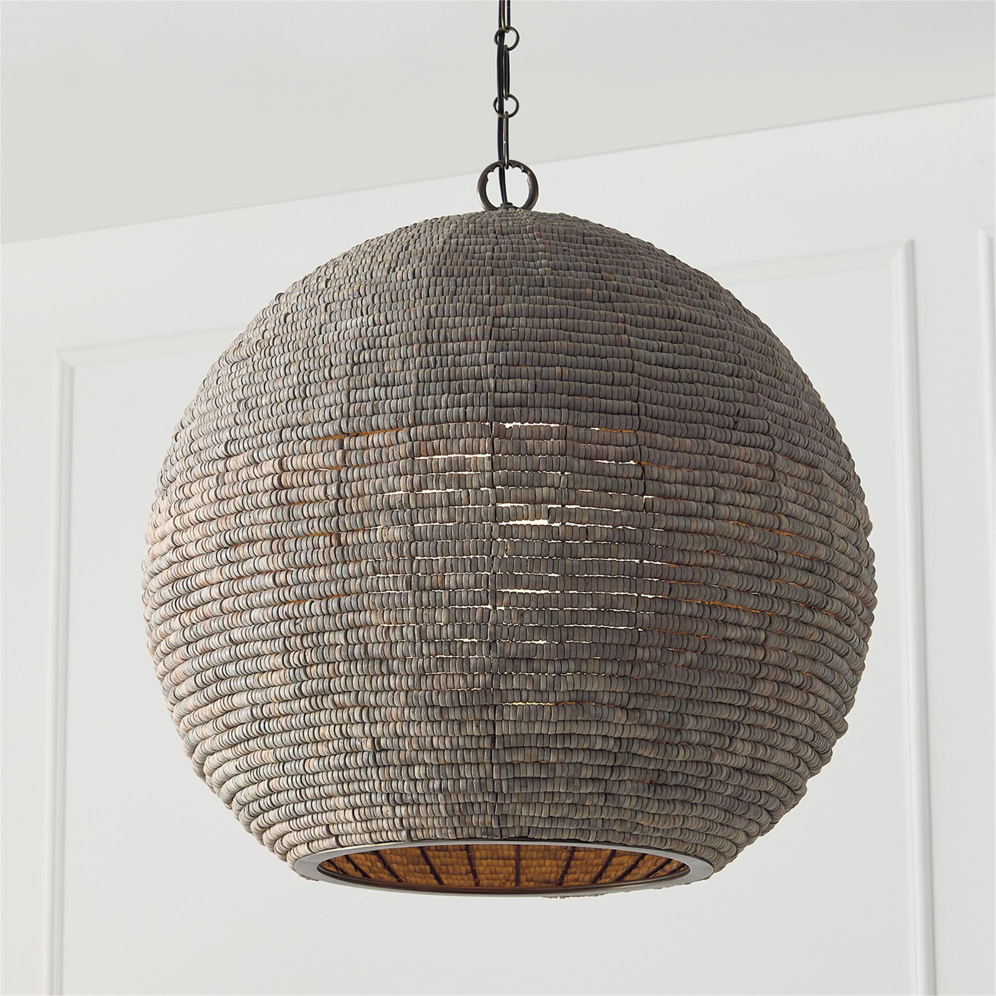 Shown in Aegean Grey And Dark Brass finish and White  Globe glass