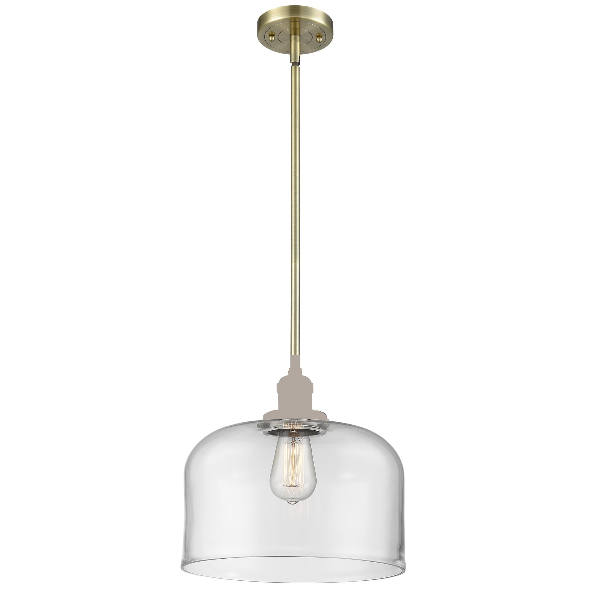 Shown in Antique Brass finish and Clear glass