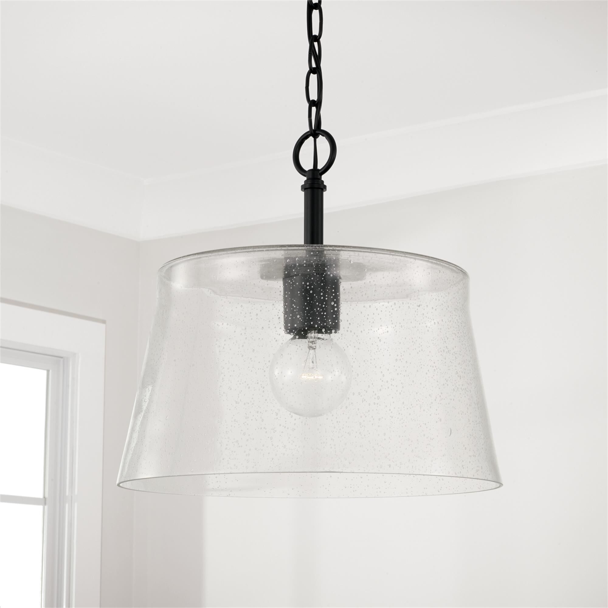 Shown in Matte Black finish and Clear Seeded glass