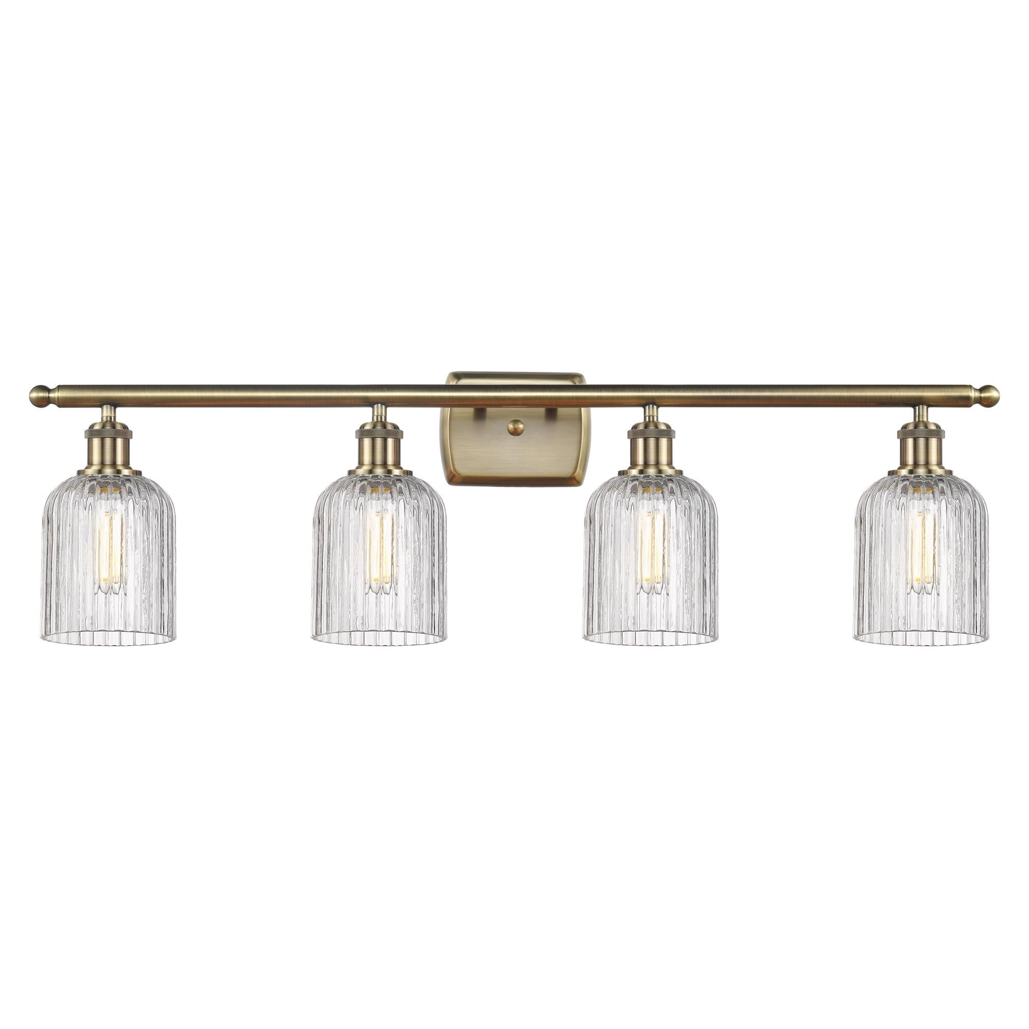 Shown in Antique Brass finish and Clear glass