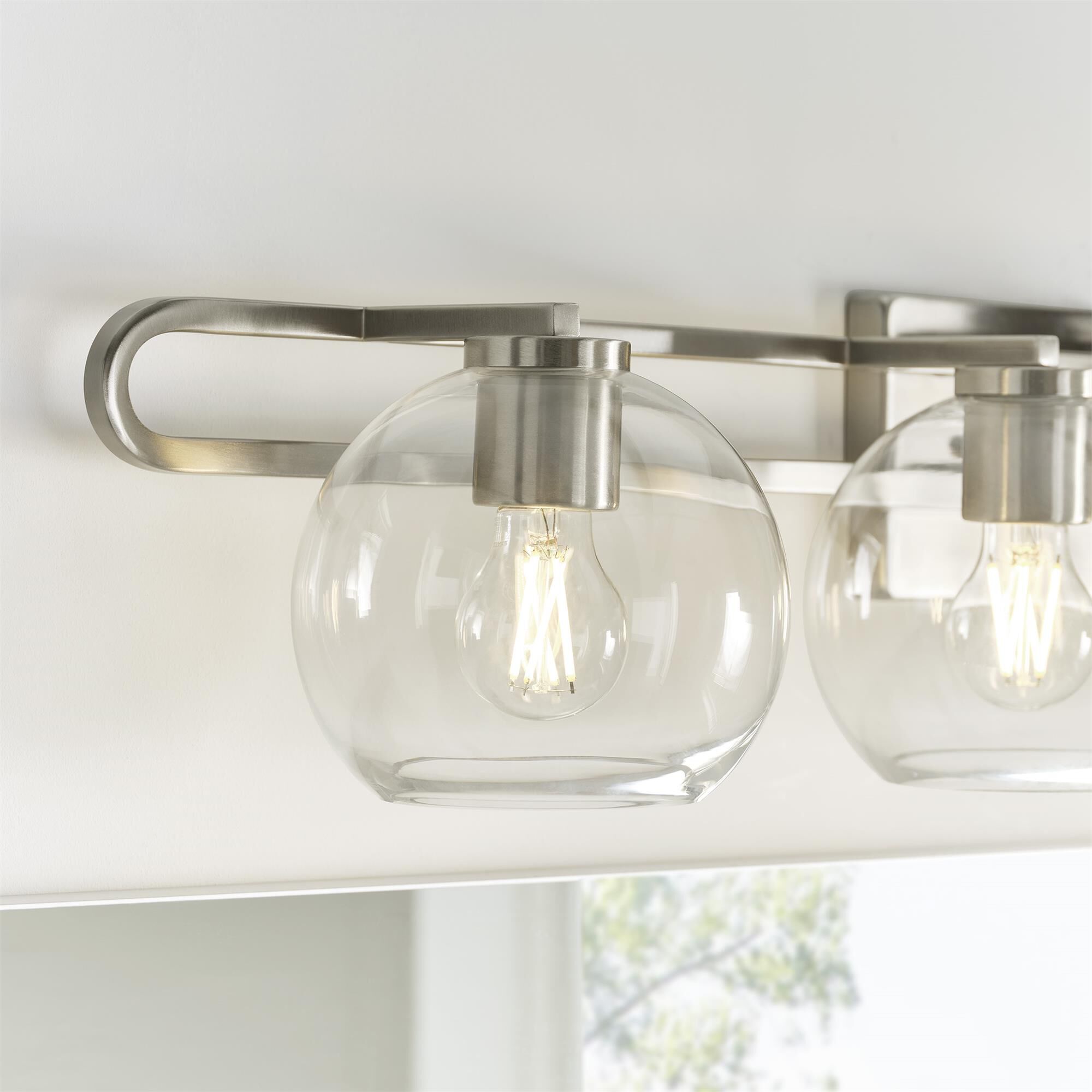 Shown in Brushed Nickel Silver finish and Clear glass