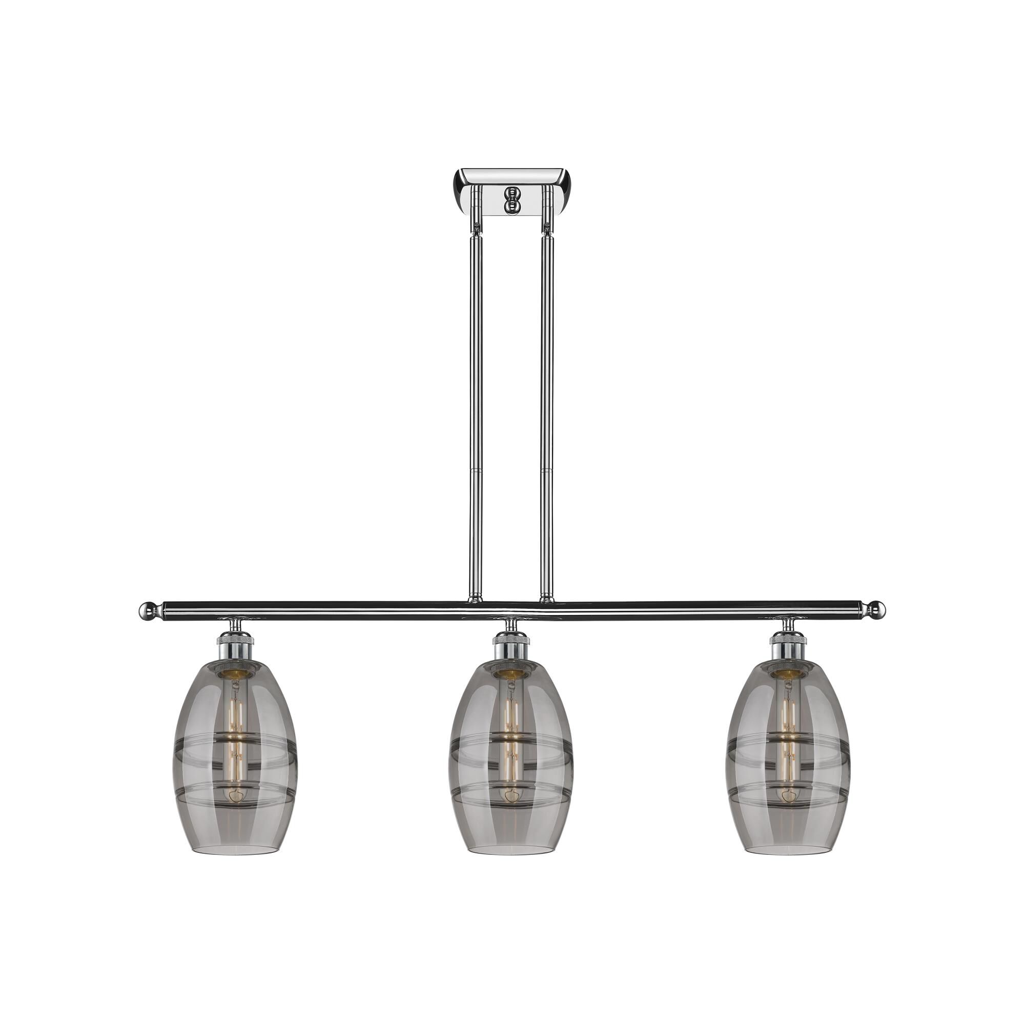 Shown in Polished Chrome finish and Light Smoke glass