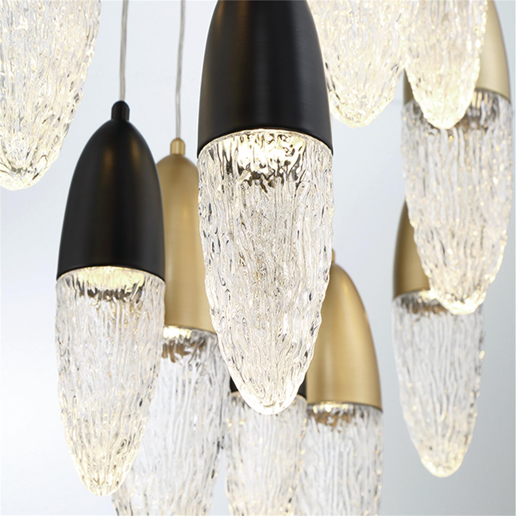 Shown in Mixed Black and Brass finish and Clear glass
