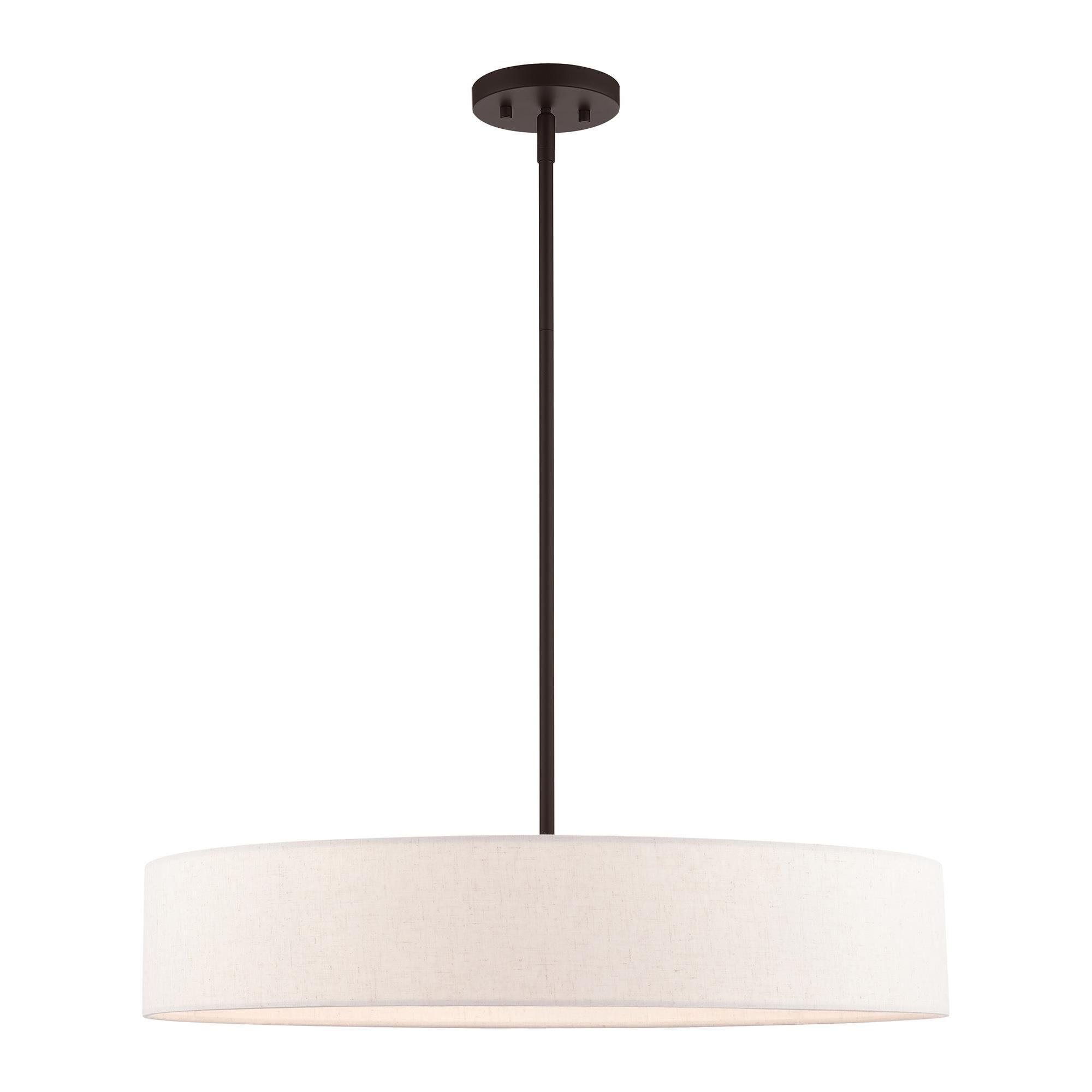 Shown in Bronze With Antique Brass Accents finish and Hand Crafted Oatmeal Fabric Hardback Shade glass and Hand Crafted Oatmeal Fabric Hardback shade