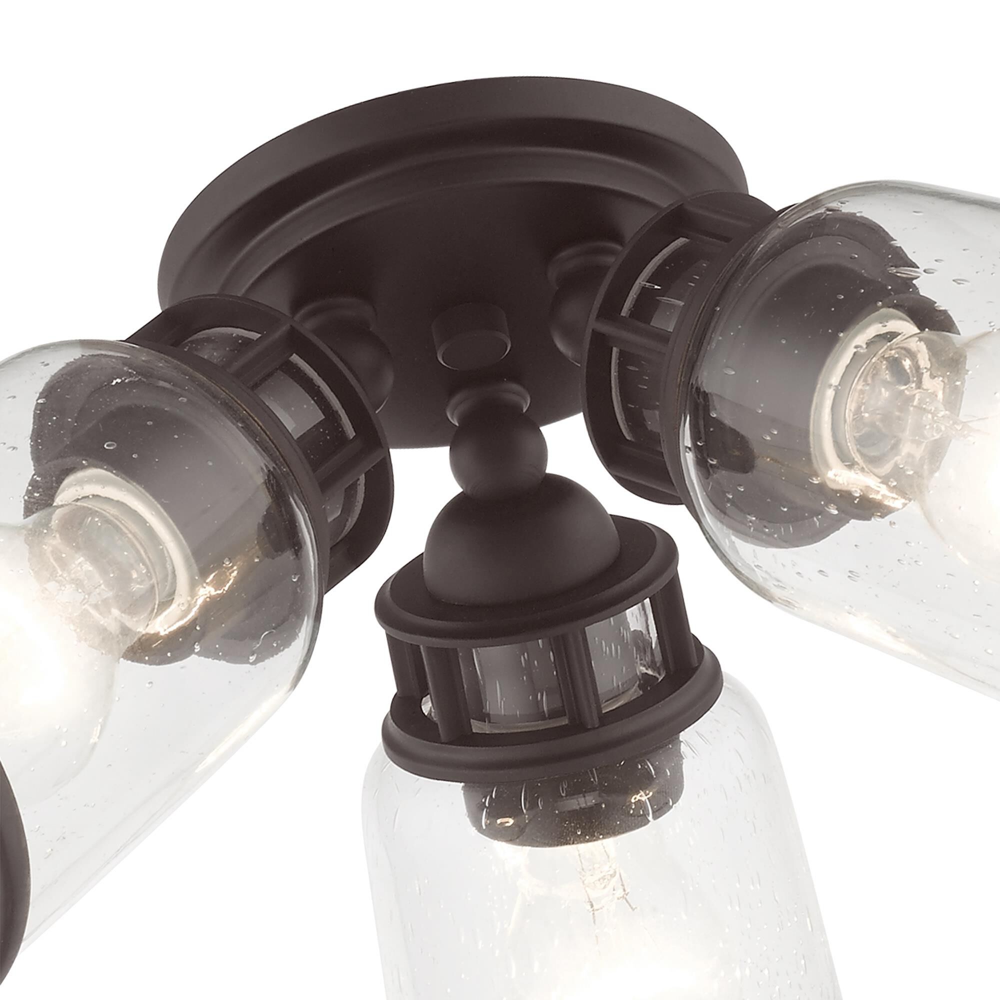 Shown in Bronze finish and Hand Blown Clear Seeded glass