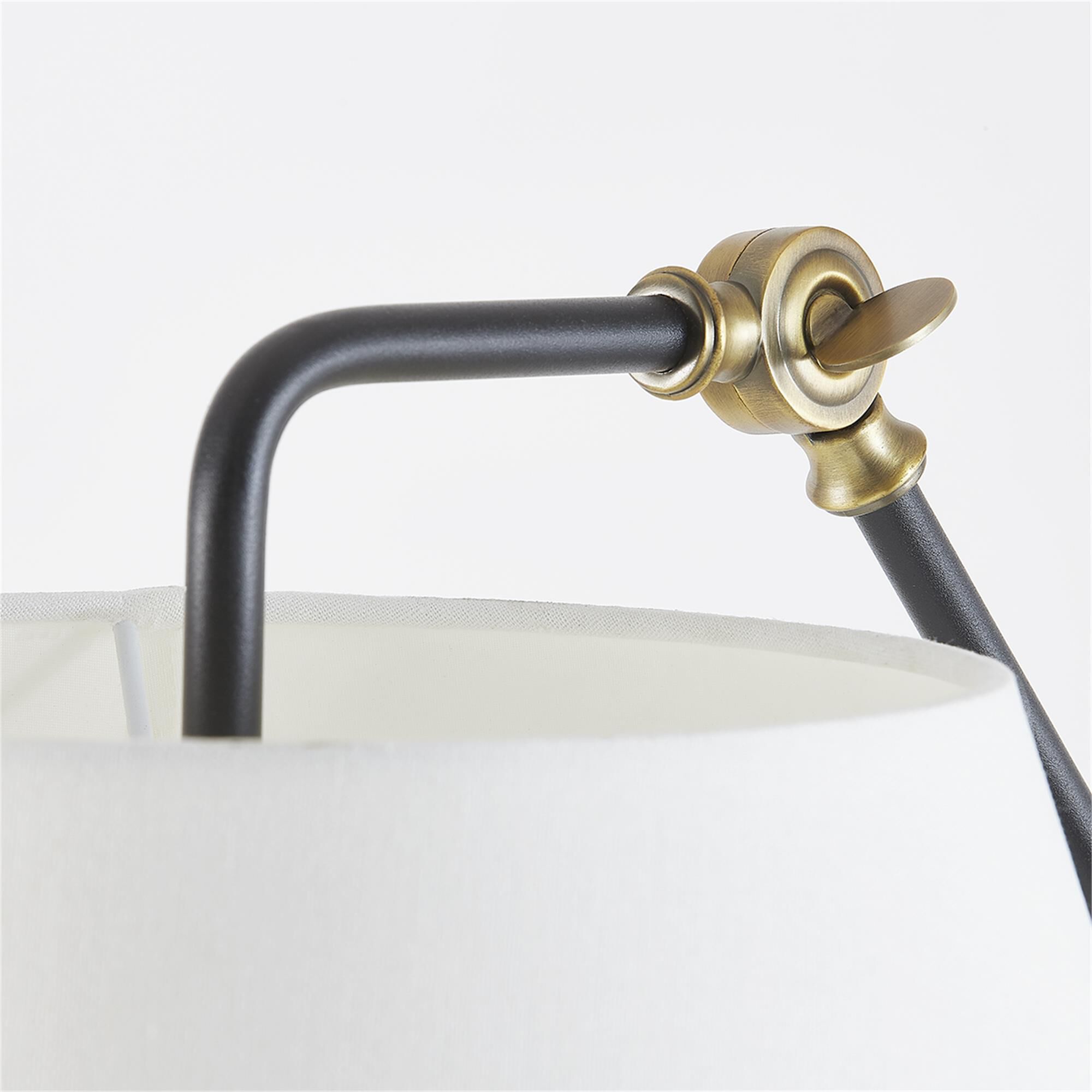 Shown in Patina Brass finish and White shade