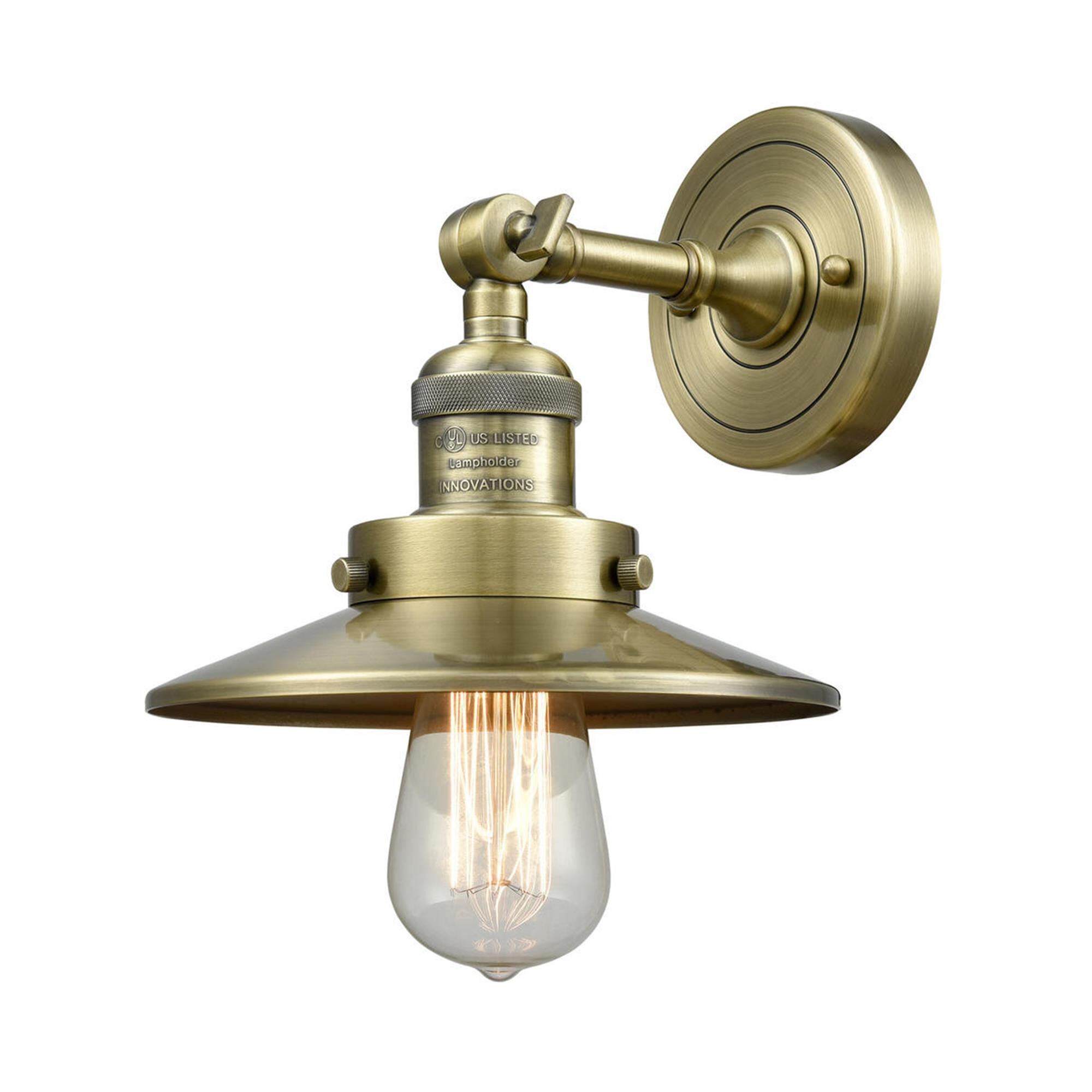 Shown in Antique Brass finish and Metal - Antique Brass - Cone shade