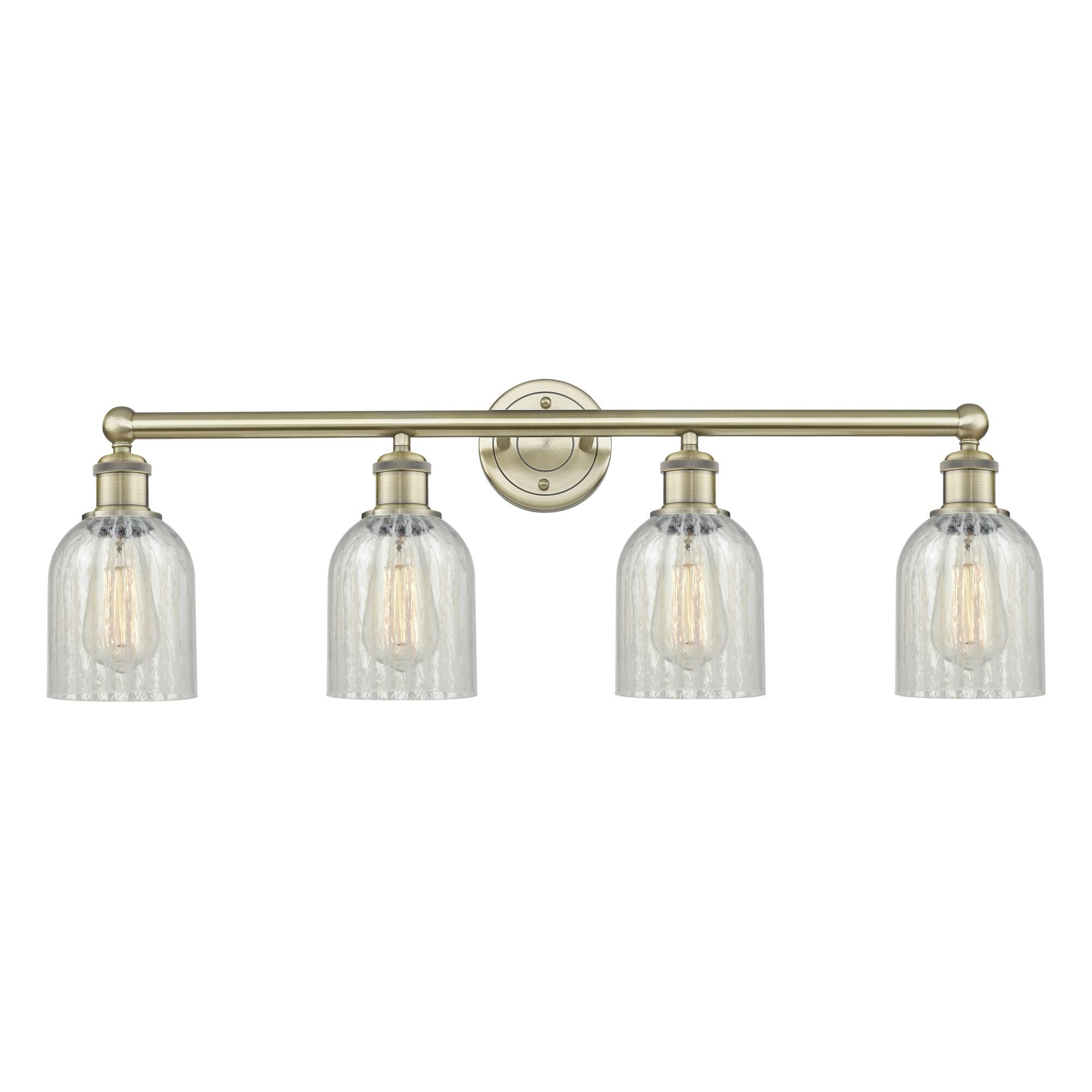 Shown in Antique Brass finish and Mouchette glass