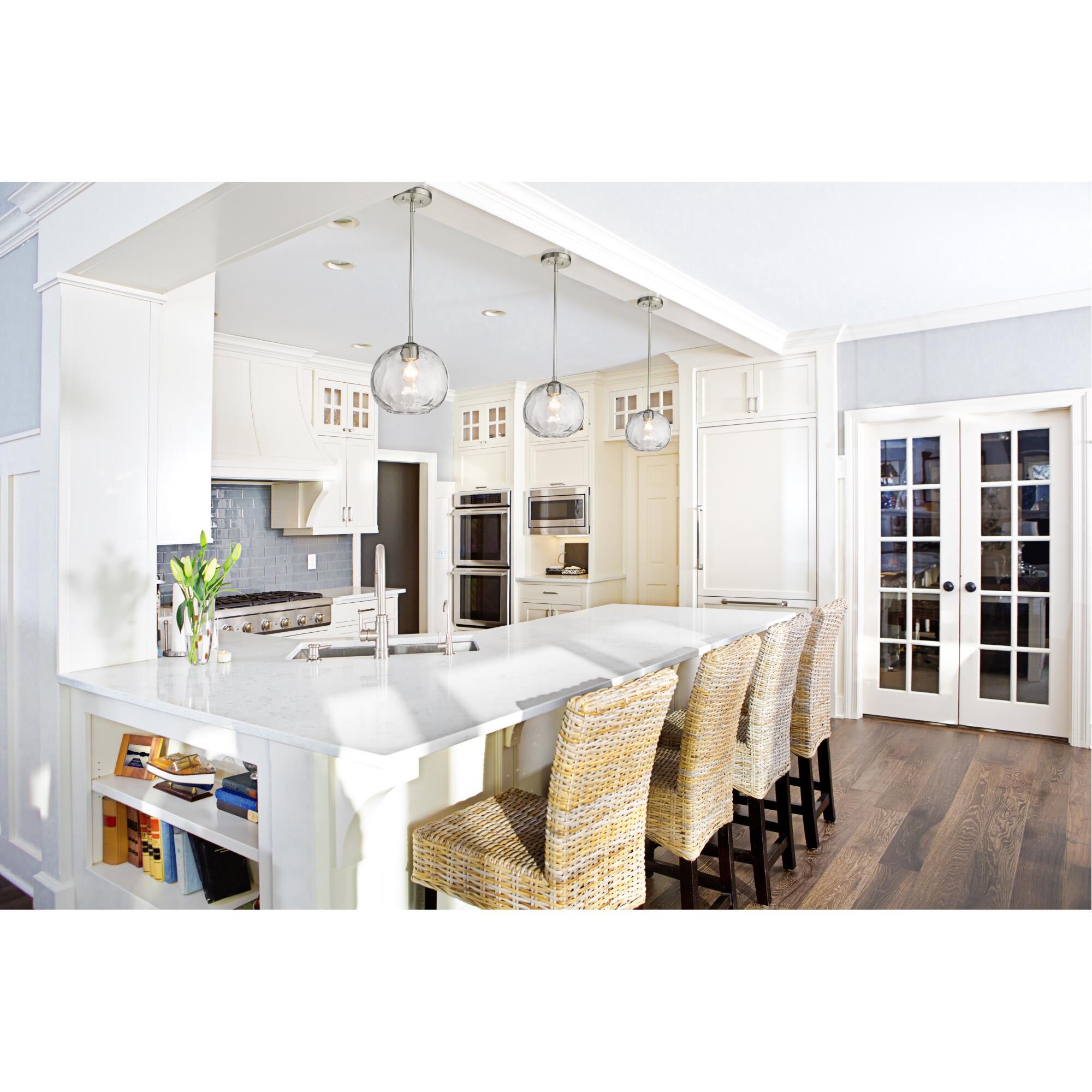 Shown in Brushed Nickel finish and Glass shade