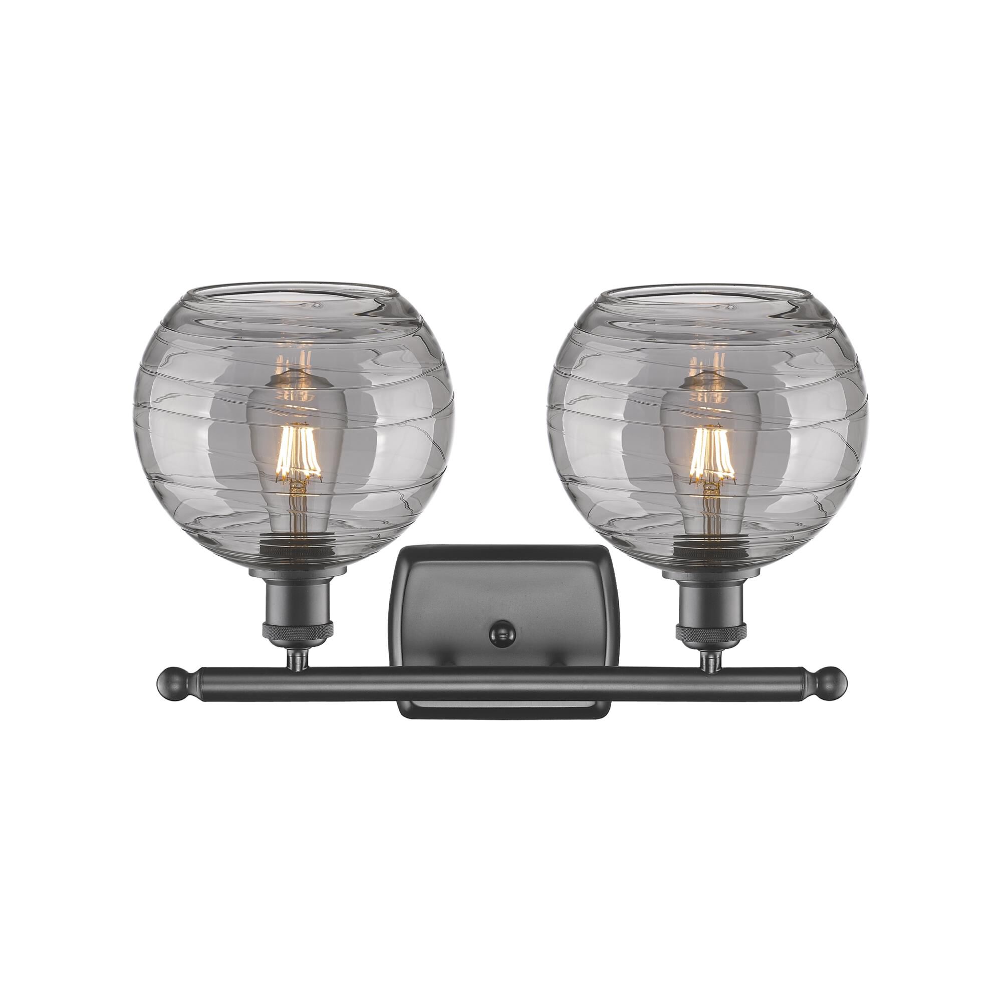 Shown in Oil Rubbed Bronze finish and Light Smoke Deco Swirl glass