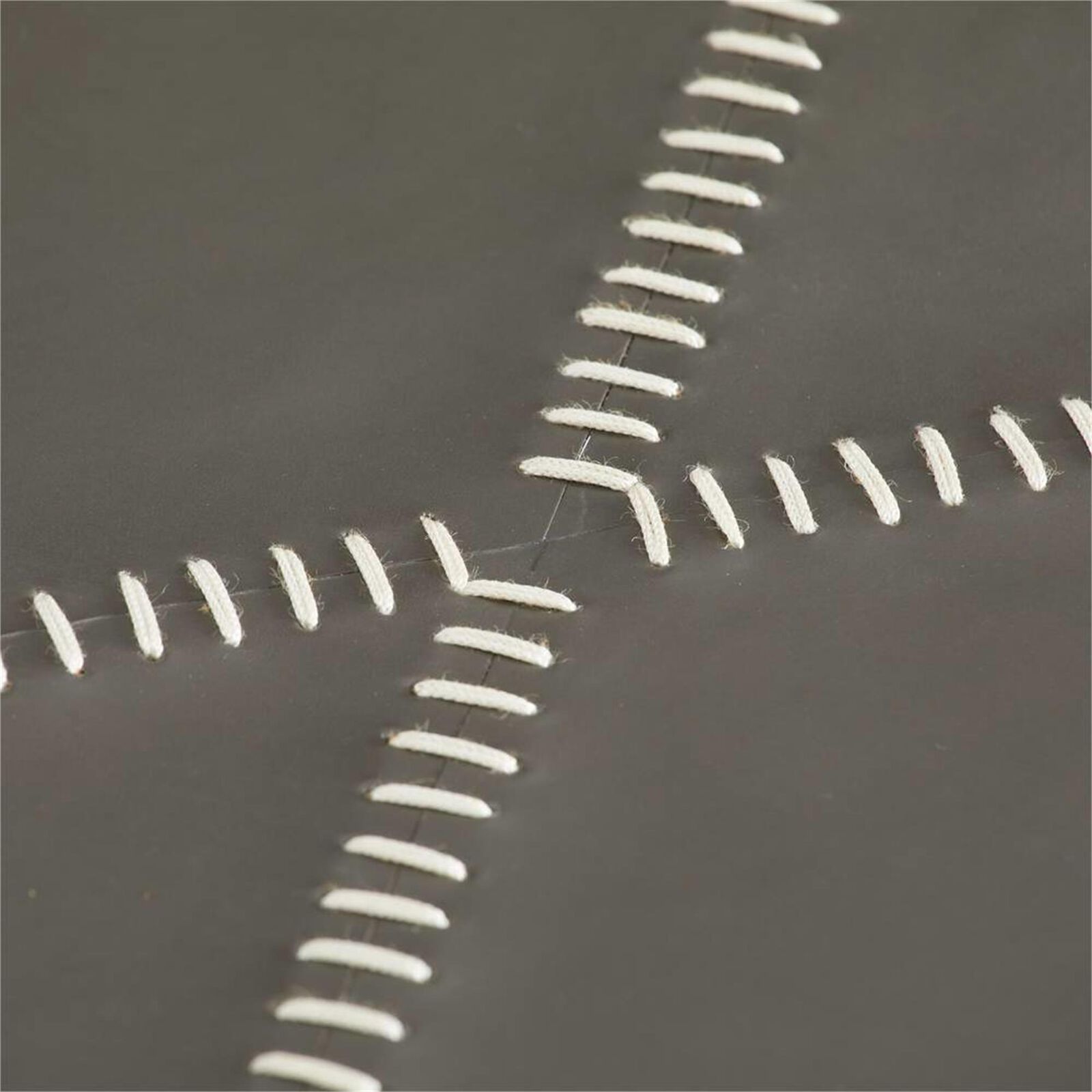 Macro view of the white stitching intersection