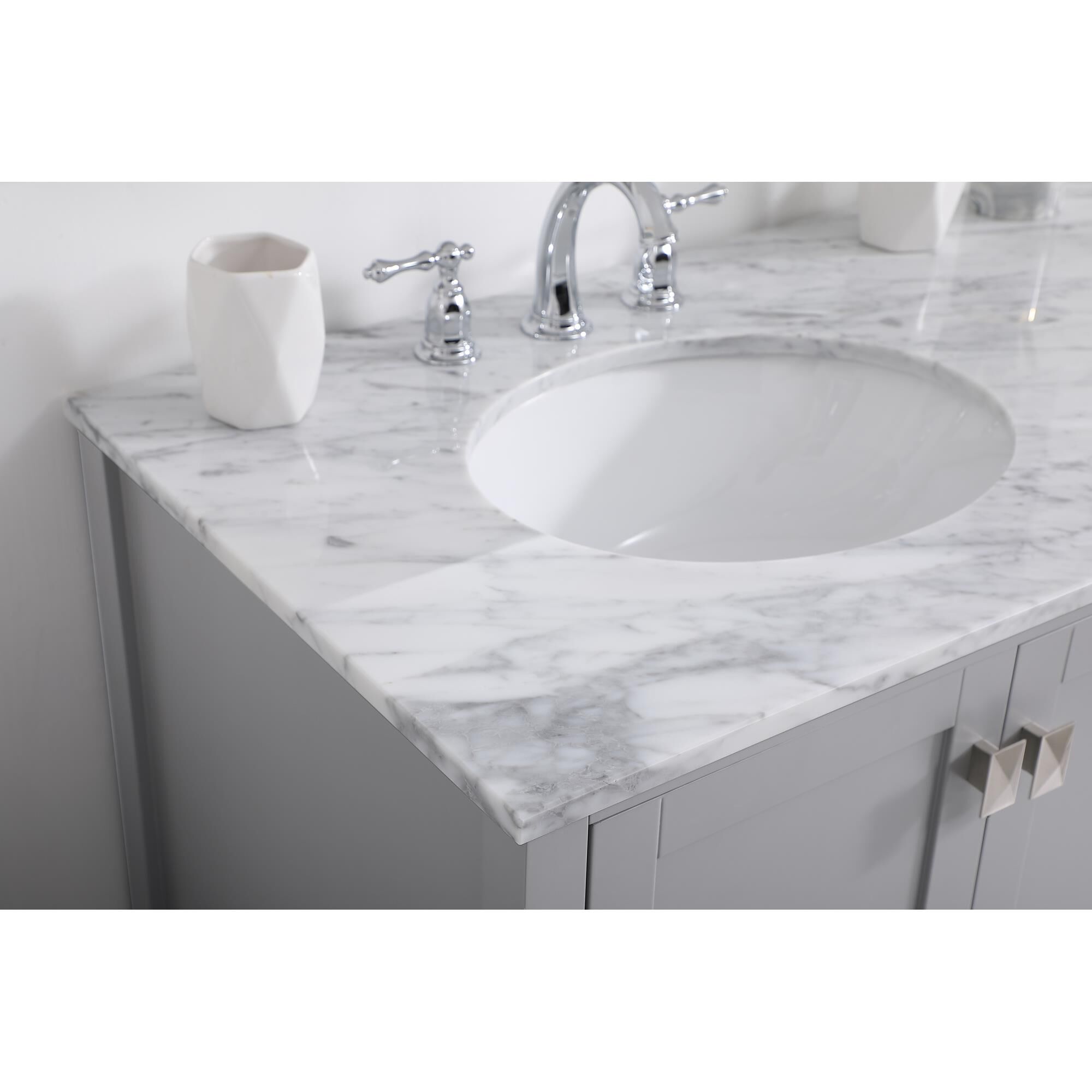 Shown in Gray And Brushed Nickel With Carrara White Marble finish
