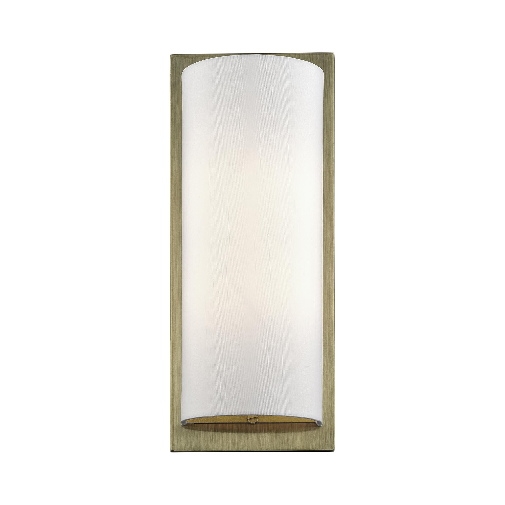 Shown in Antique Brass finish and Hand Crafted Off-White Fabric Hardback shade