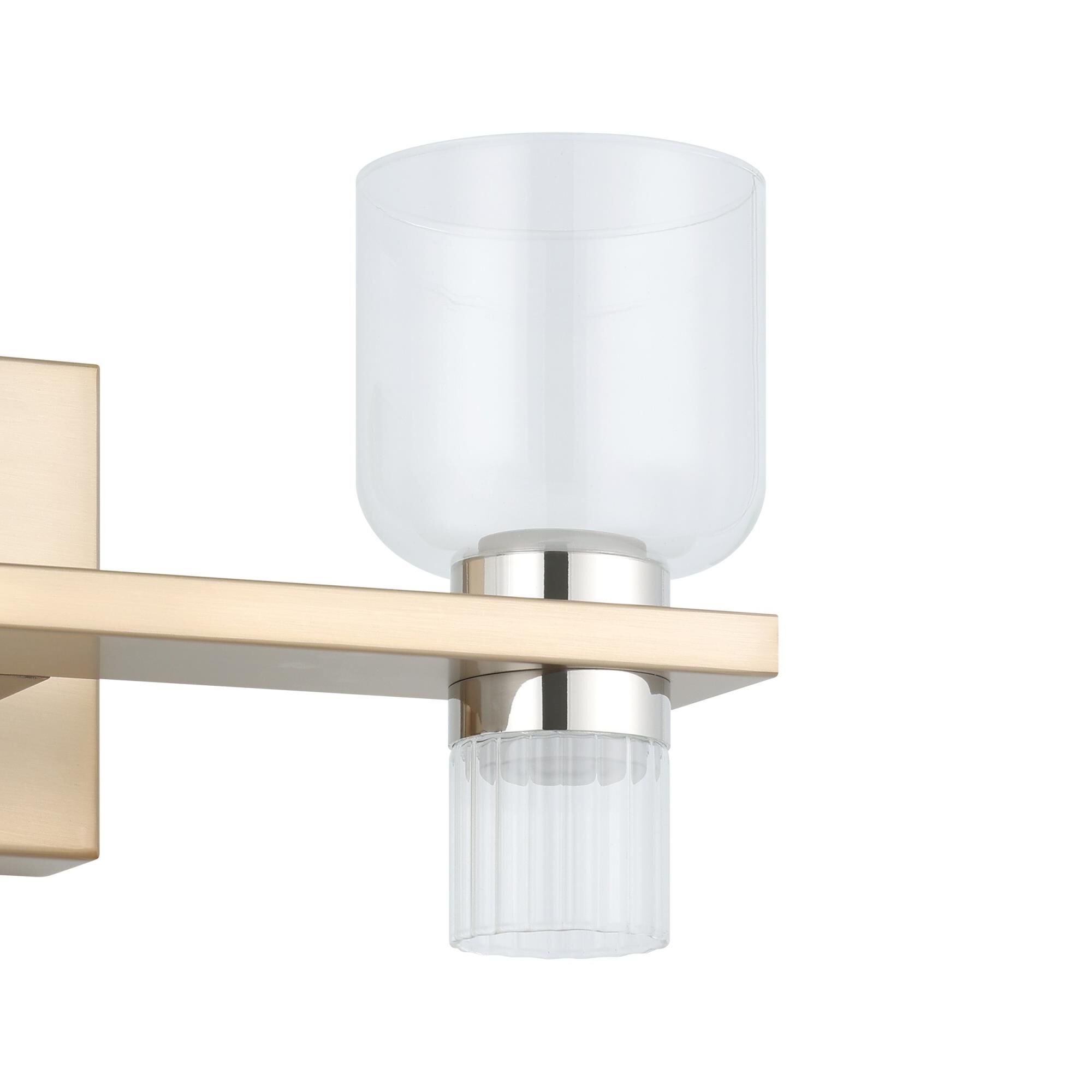Shown in Champagne Gold finish and Clear, Clear Ribbed glass