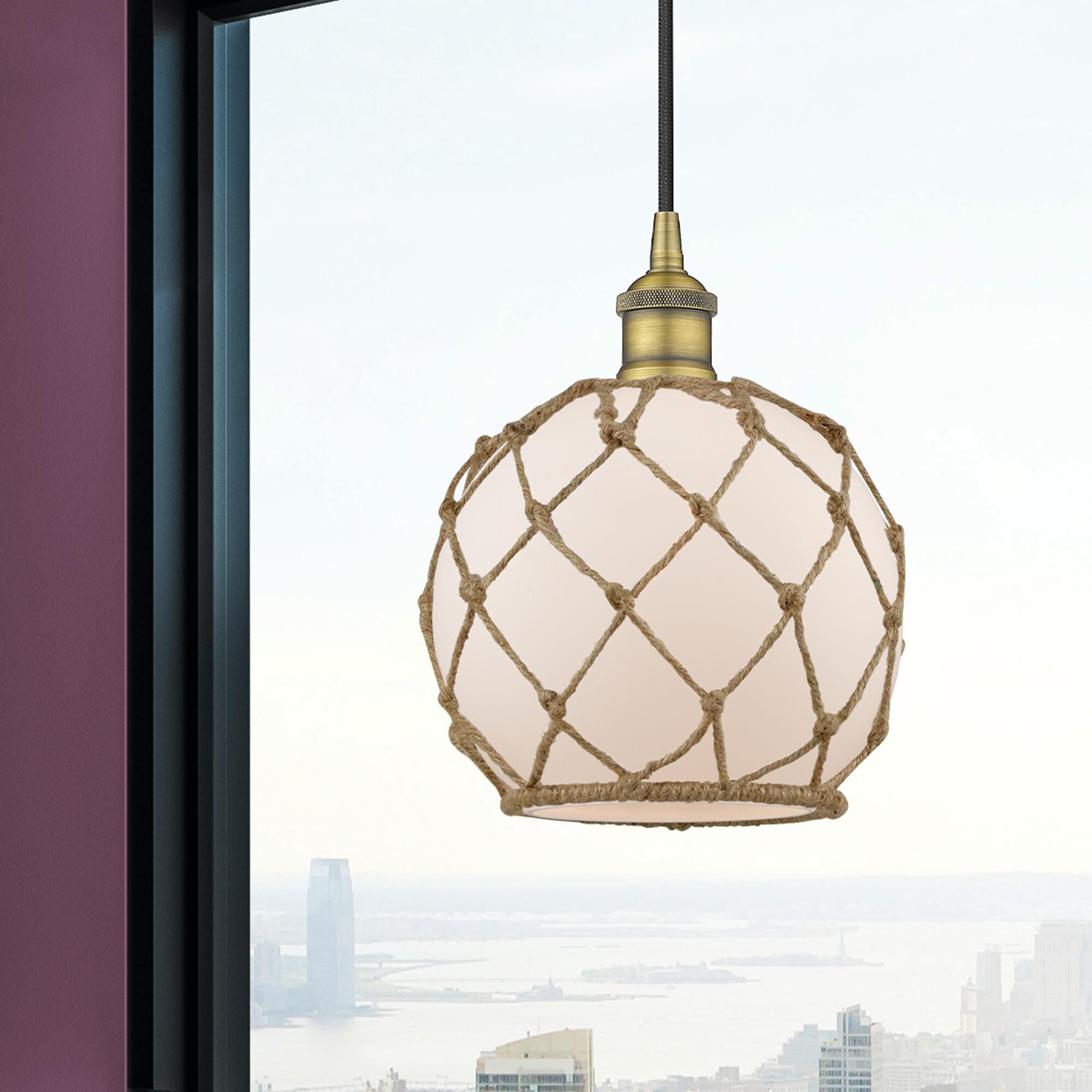 Shown in Brushed Brass finish and White Farmhouse With Brown Rope glass