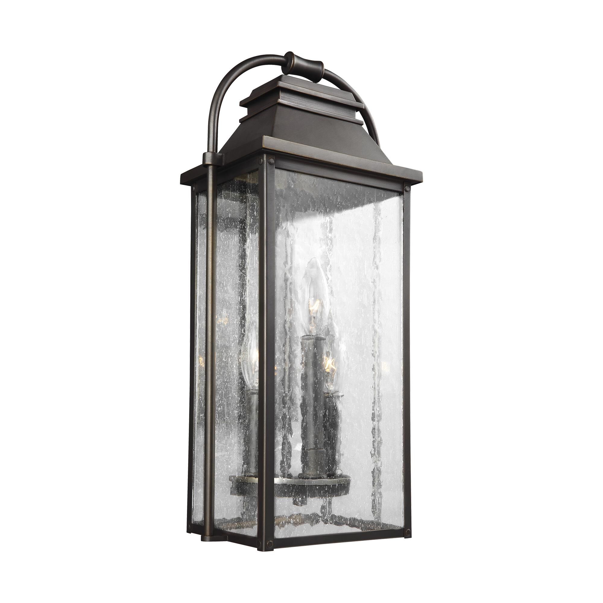 Shown in Antique Bronze finish and Clear Seeded Panels glass